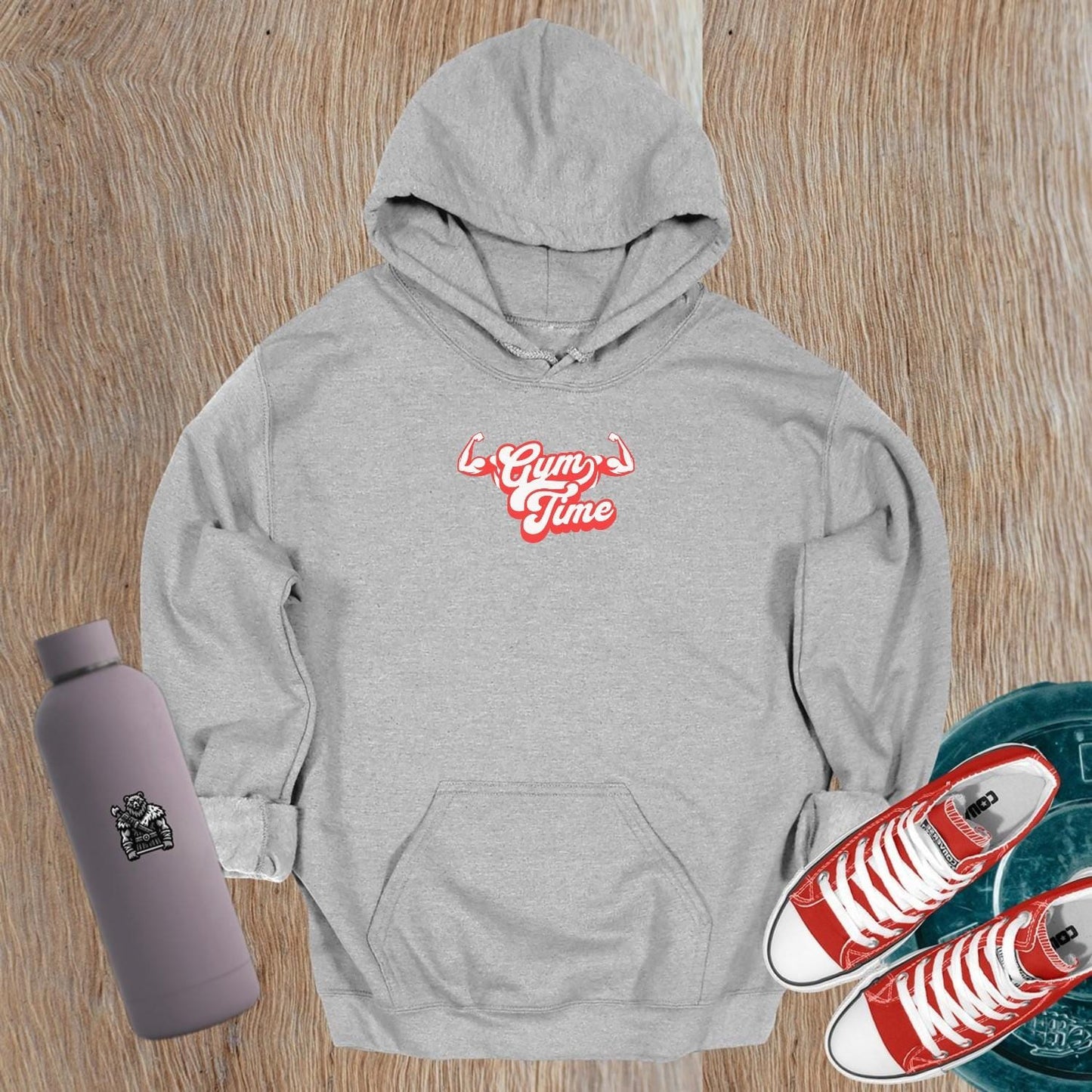 "Stylish 'Gym Time' hoodie featuring a bold graphic design, perfect for fitness enthusiasts. Ideal for workouts or casual wear."