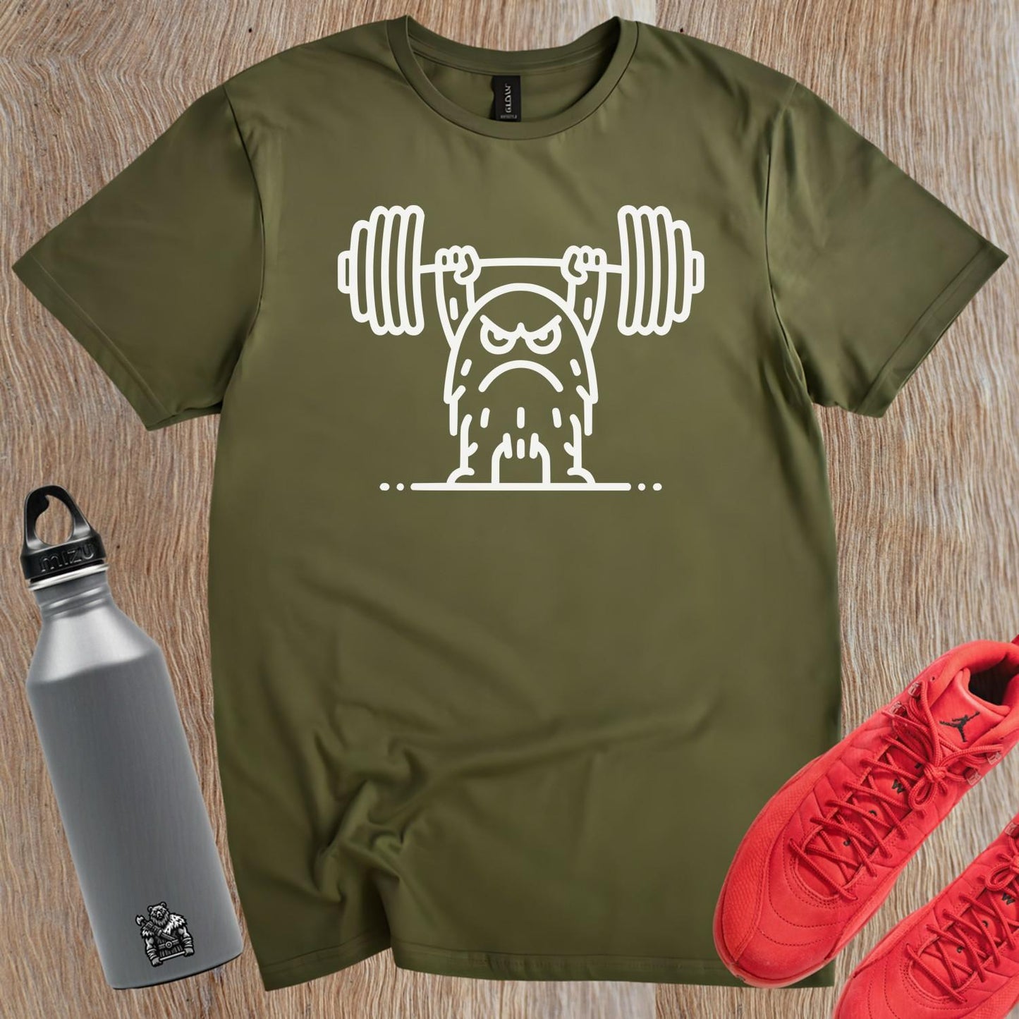 "Bold gym T-shirt featuring a fierce weightlifting monster design. Ideal for fitness enthusiasts, showcasing strength and motivation."