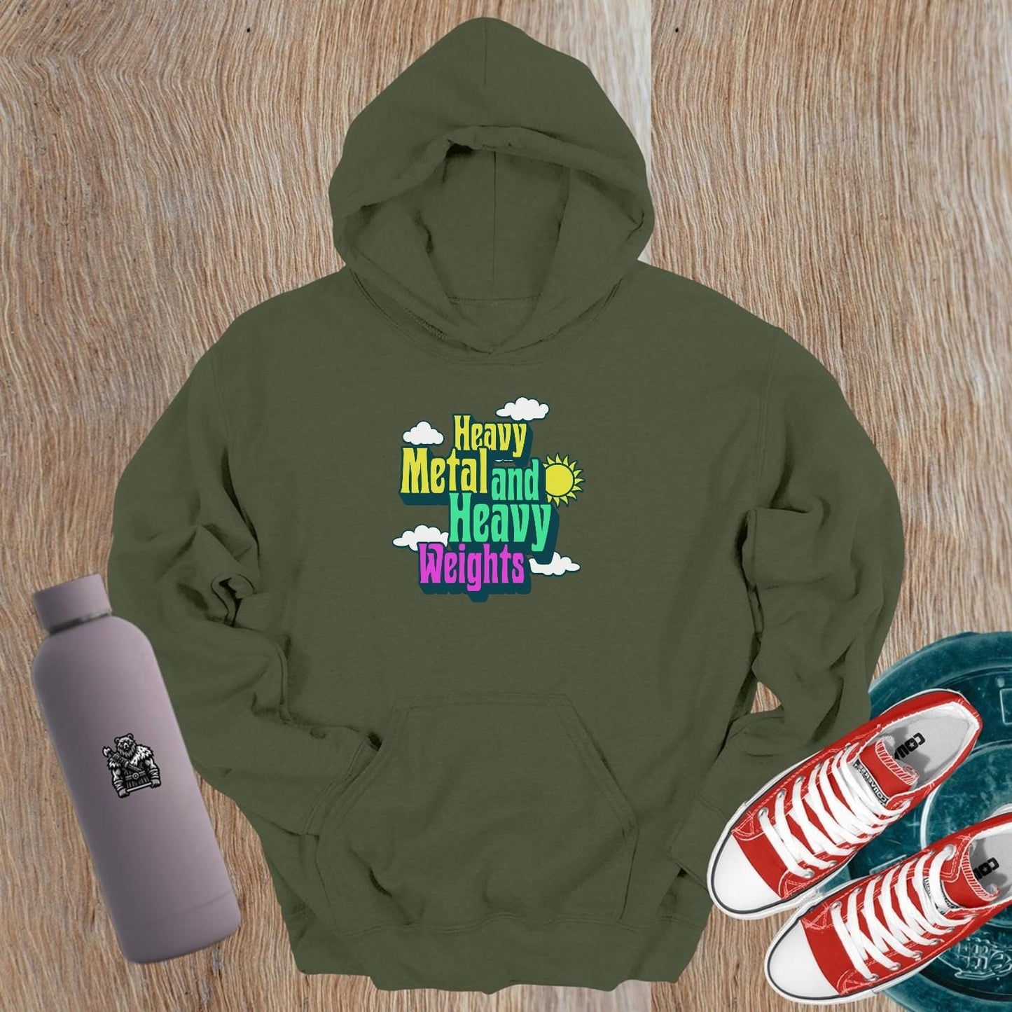 "Heavy Metal and Heavy Weights hoodie featuring vibrant graphics of weights and musical elements, perfect for fitness enthusiasts and gym lovers."
