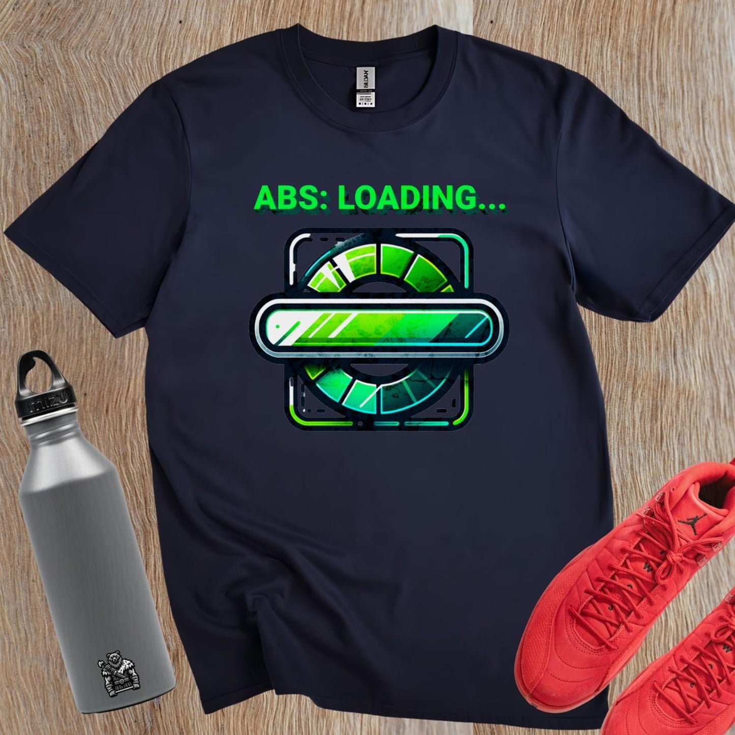 "Vibrant gym T-shirt featuring 'ABS: LOADING...' design, perfect for athletes and fitness enthusiasts, showcasing style and motivation."