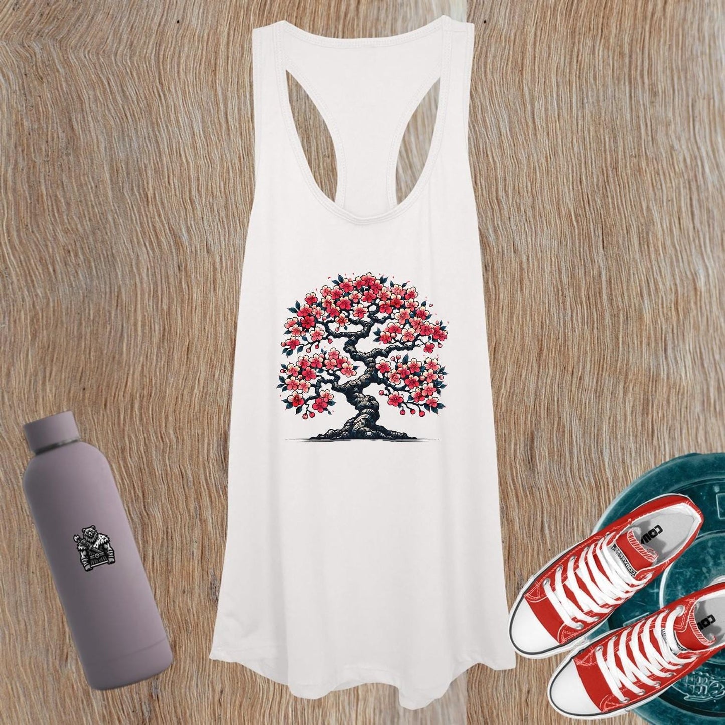 "Women's gym tank top featuring a vibrant blossom tree design symbolizing strength and growth, perfect for workouts and casual outings."