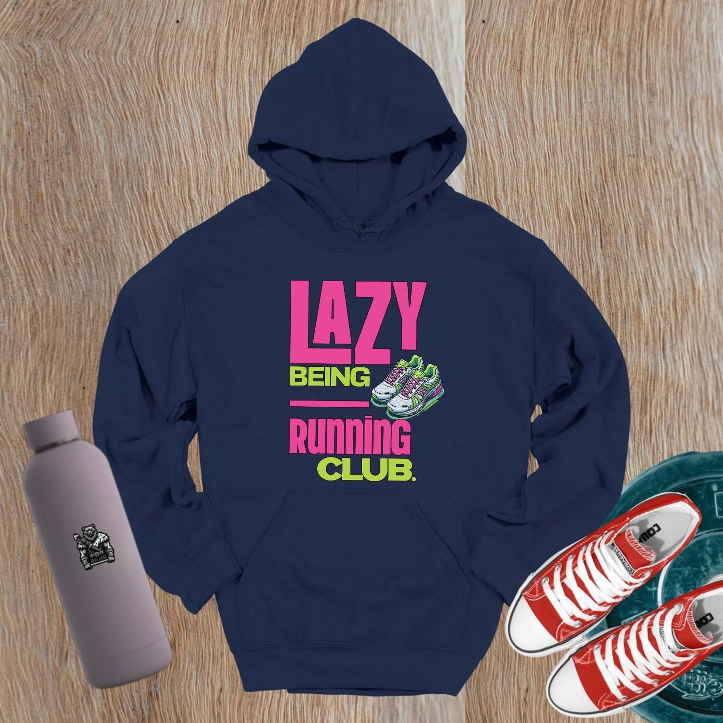 "Vibrant 'Lazy Being Running Club' hoodie featuring a playful graphic, perfect for gym workouts and lounging in style. Activewear essential!"