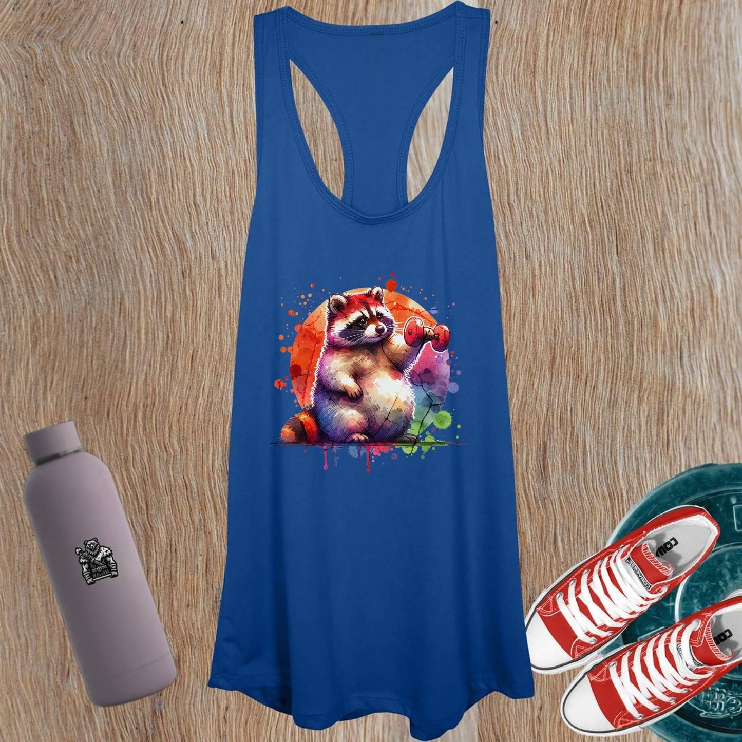 "Vibrant women's tank top featuring a playful raccoon lifting a dumbbell, perfect for gym workouts, yoga, and active wear style."