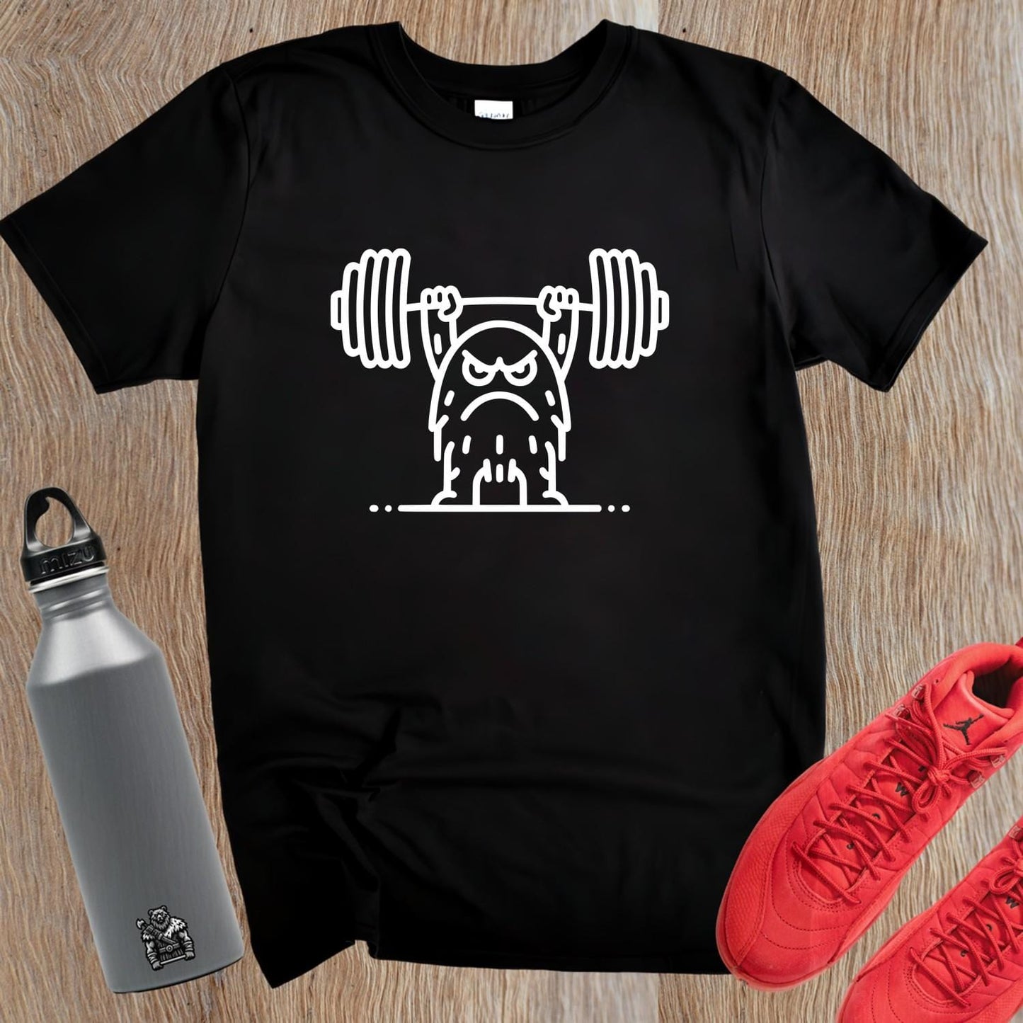 "Bold gym T-shirt featuring a fierce weightlifting monster design. Ideal for fitness enthusiasts, showcasing strength and motivation."