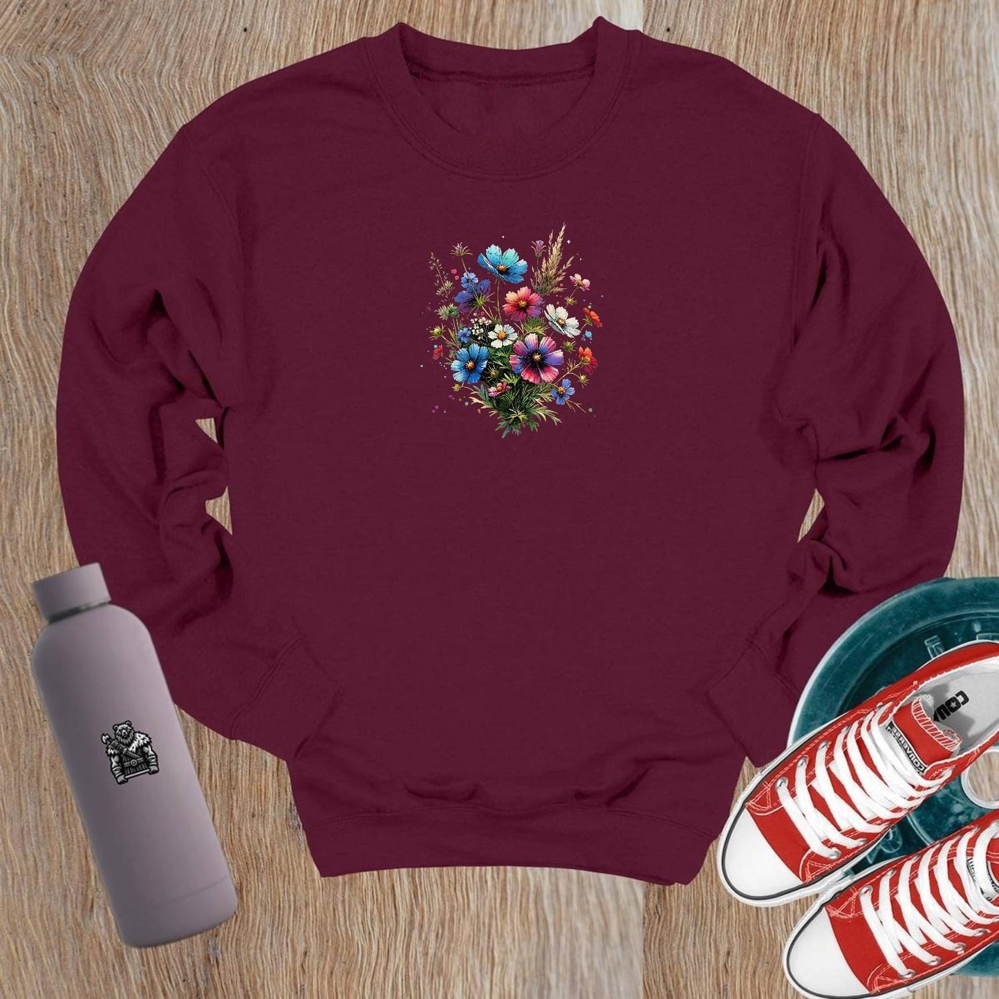 "Vibrant crewneck sweatshirt with a stunning floral design, perfect for workouts. Cozy and stylish for gym or casual wear."