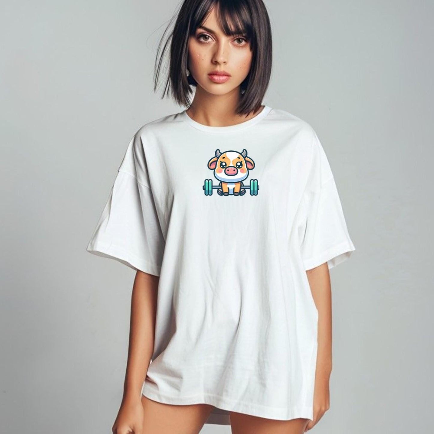 "Adorable Cow Gym T-Shirt featuring a cute cow lifting weights, perfect for fitness enthusiasts who enjoy humor and unique style."