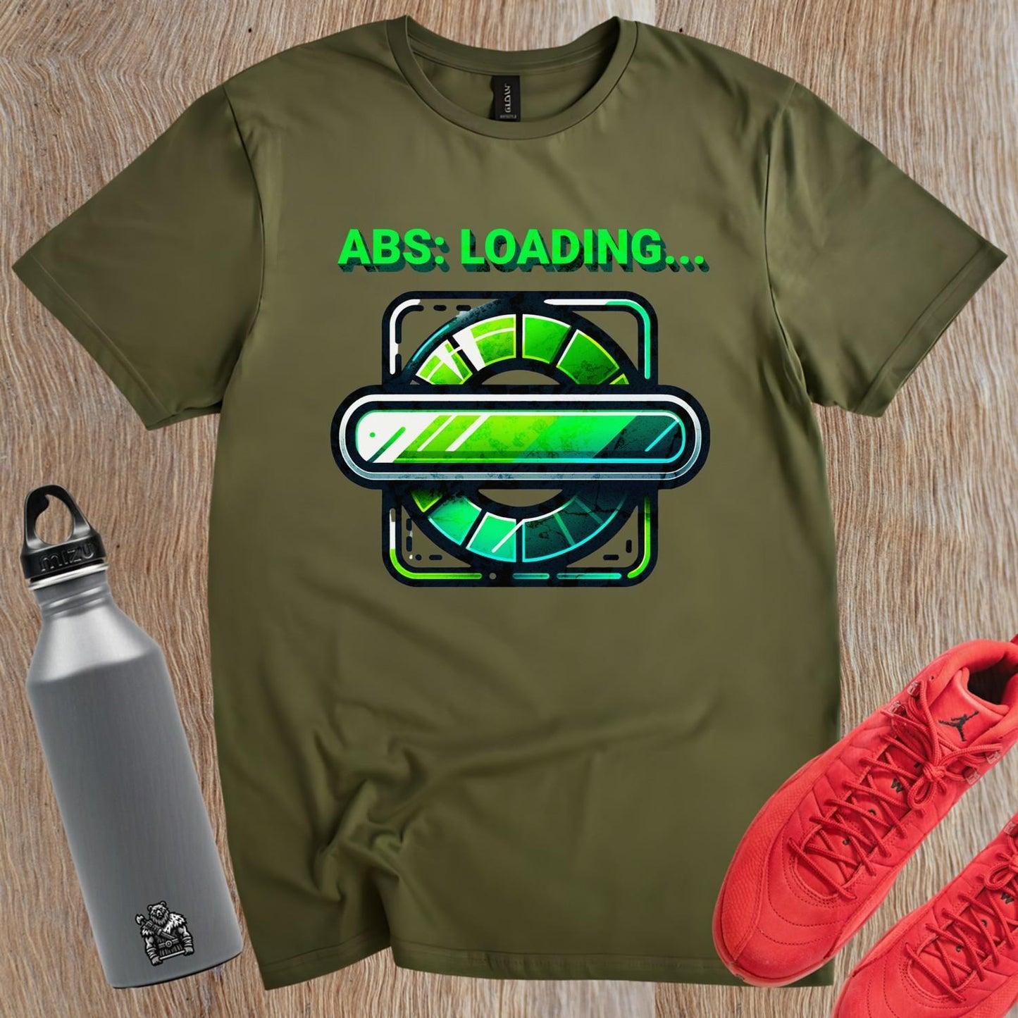 "Vibrant gym T-shirt featuring 'ABS: LOADING...' design, perfect for athletes and fitness enthusiasts, showcasing style and motivation."
