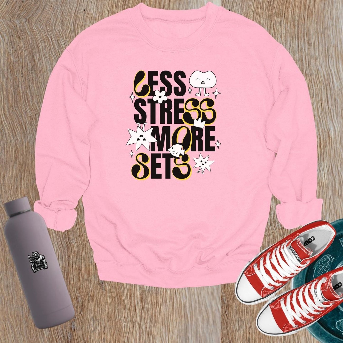 "Vibrant gym sweatshirt with unique designs, ideal for workouts or lounging, paired with leggings for a confident, stylish look."