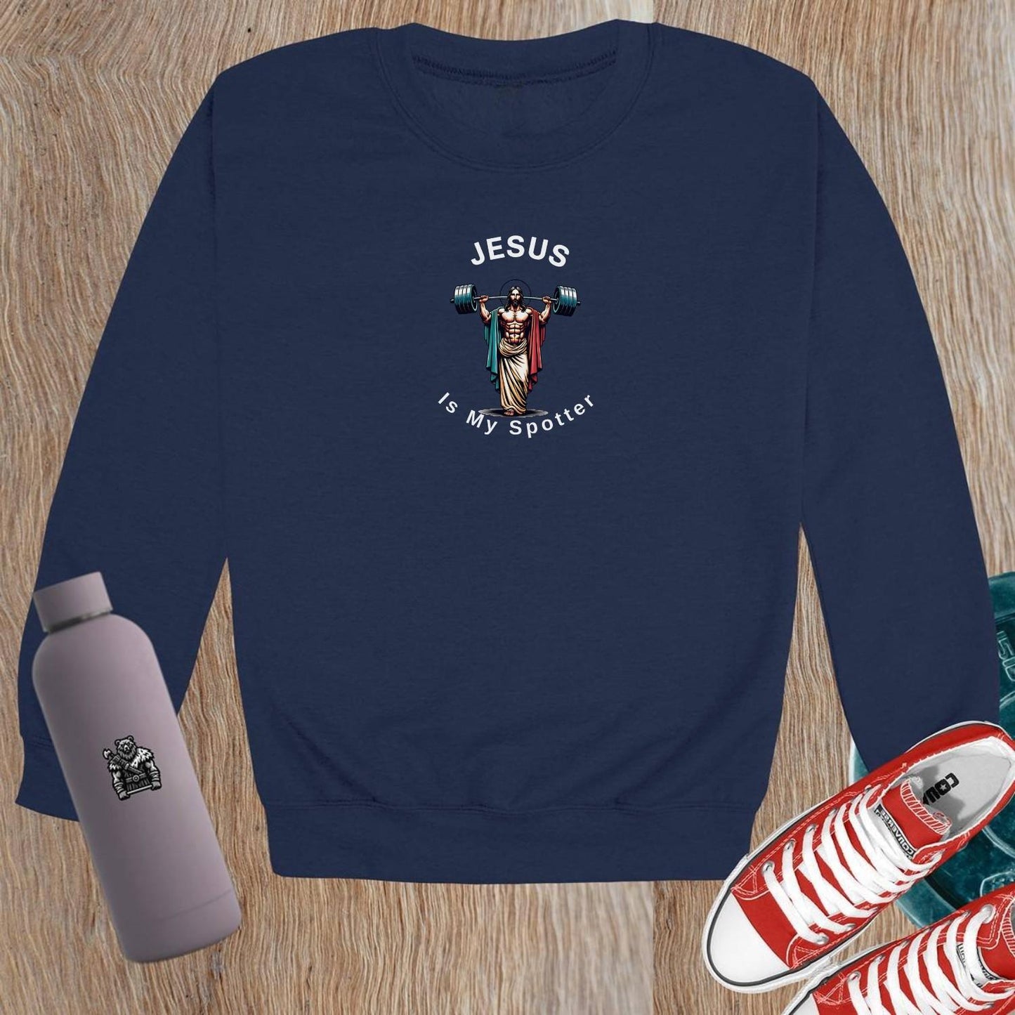 Alt text: "Bold crewneck sweatshirt with 'Jesus is My Spotter' statement, perfect for gym enthusiasts. Stylish and comfortable for workouts."