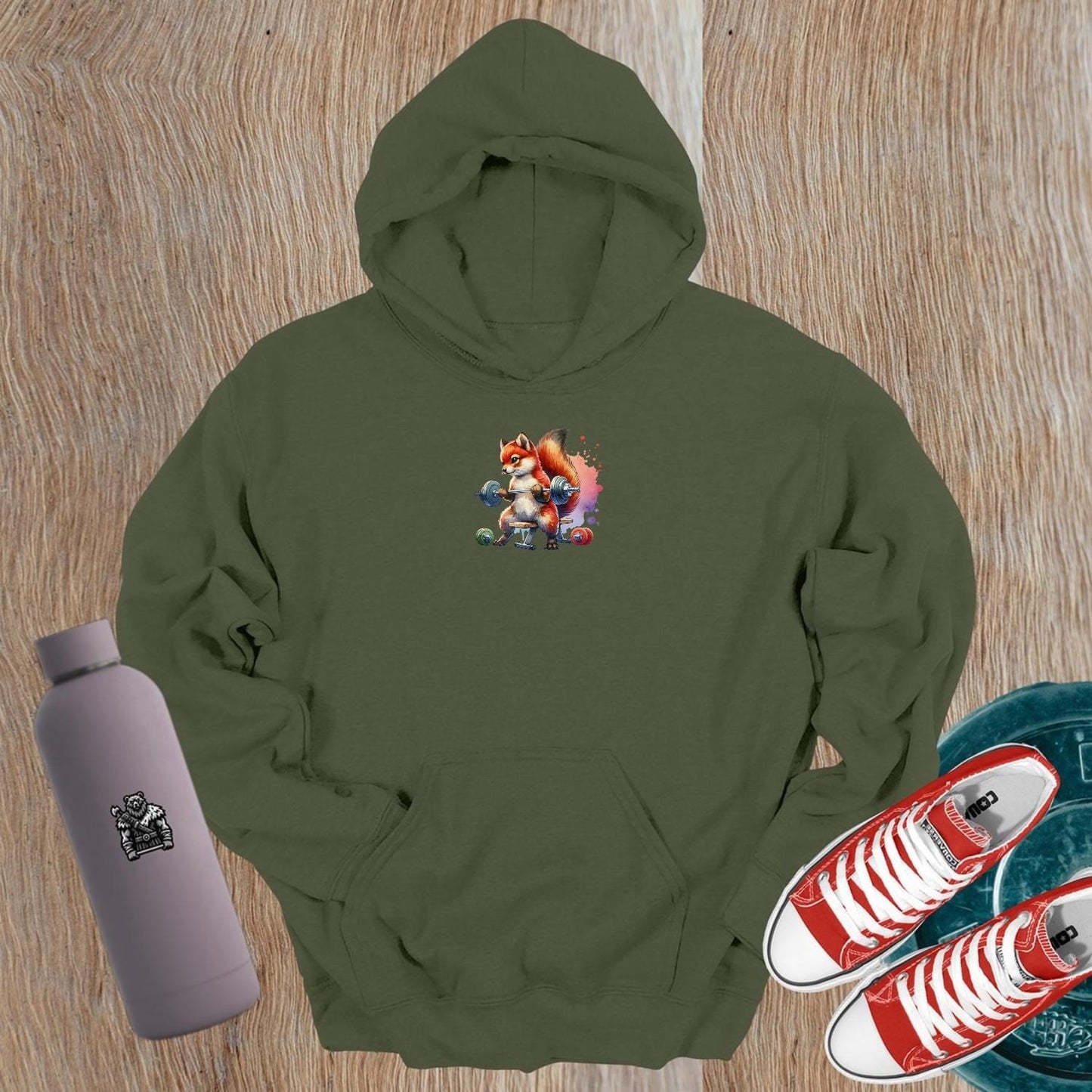 "Eye-catching gym hoodie featuring a playful fox lifting weights, blending style and motivation for fitness enthusiasts. Perfect for workouts!"
