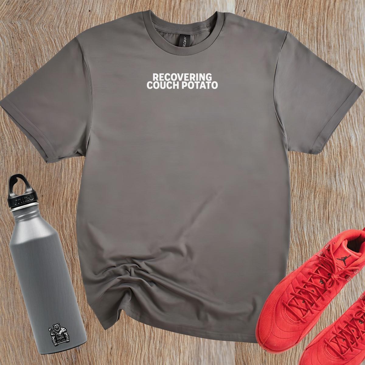 Alt text: "Stylish ‘Recovering Couch Potato’ T-shirt featuring bold graphic design, perfect for workouts or casual outings, showcasing fitness humor."