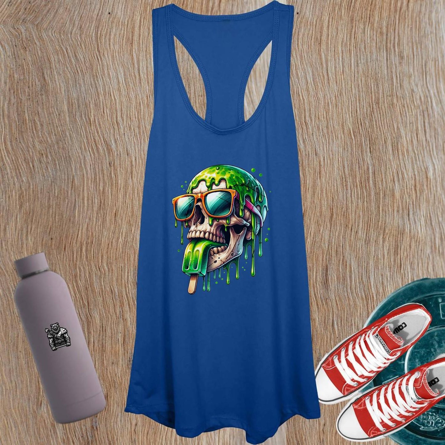 "Women's tank top featuring bold skull graphic, perfect for fearless fitness enthusiasts. Ideal for gym workouts and unique style."