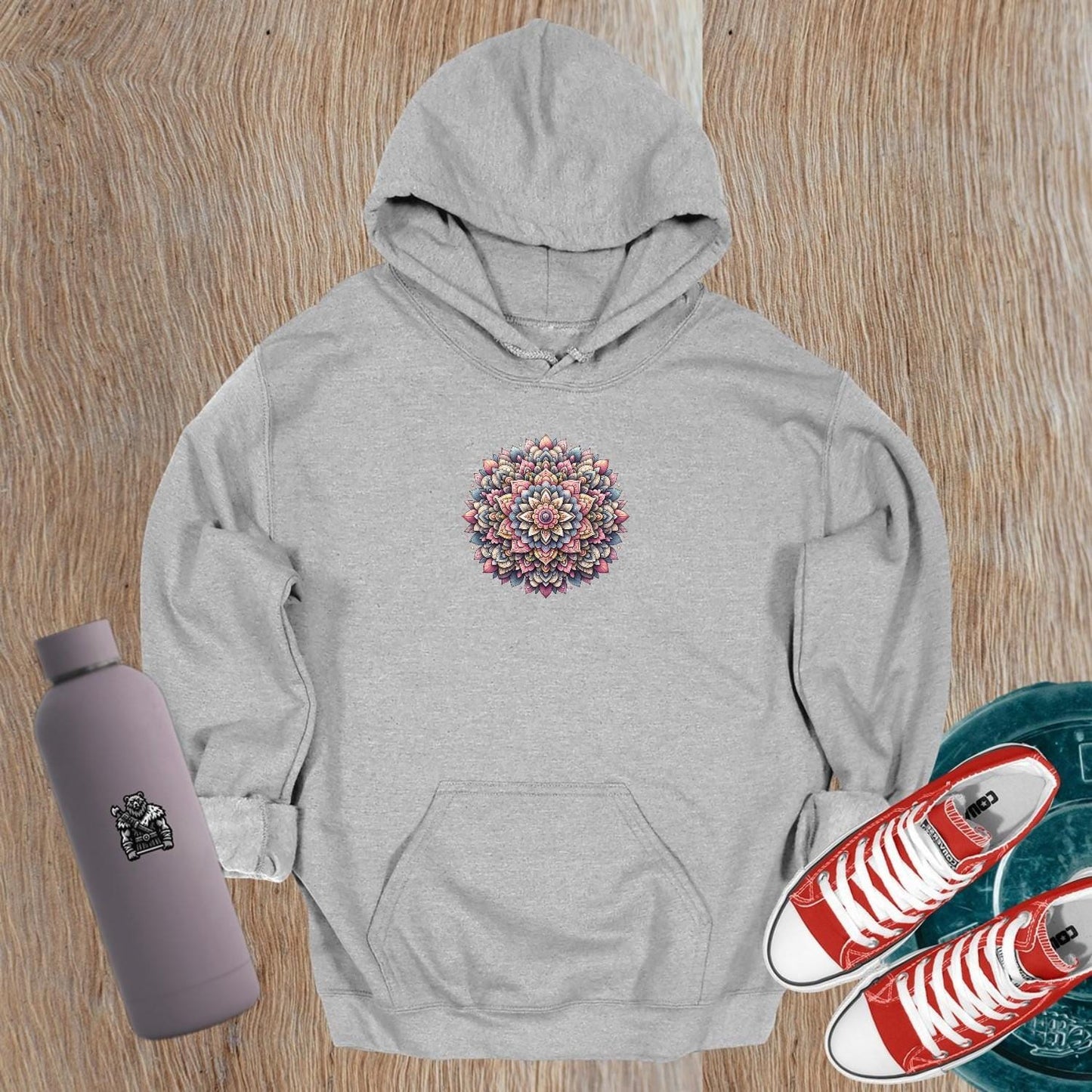 "Eye-catching gym hoodie featuring a vibrant mandala pattern, perfect for workouts or casual outings, combining style and comfort."