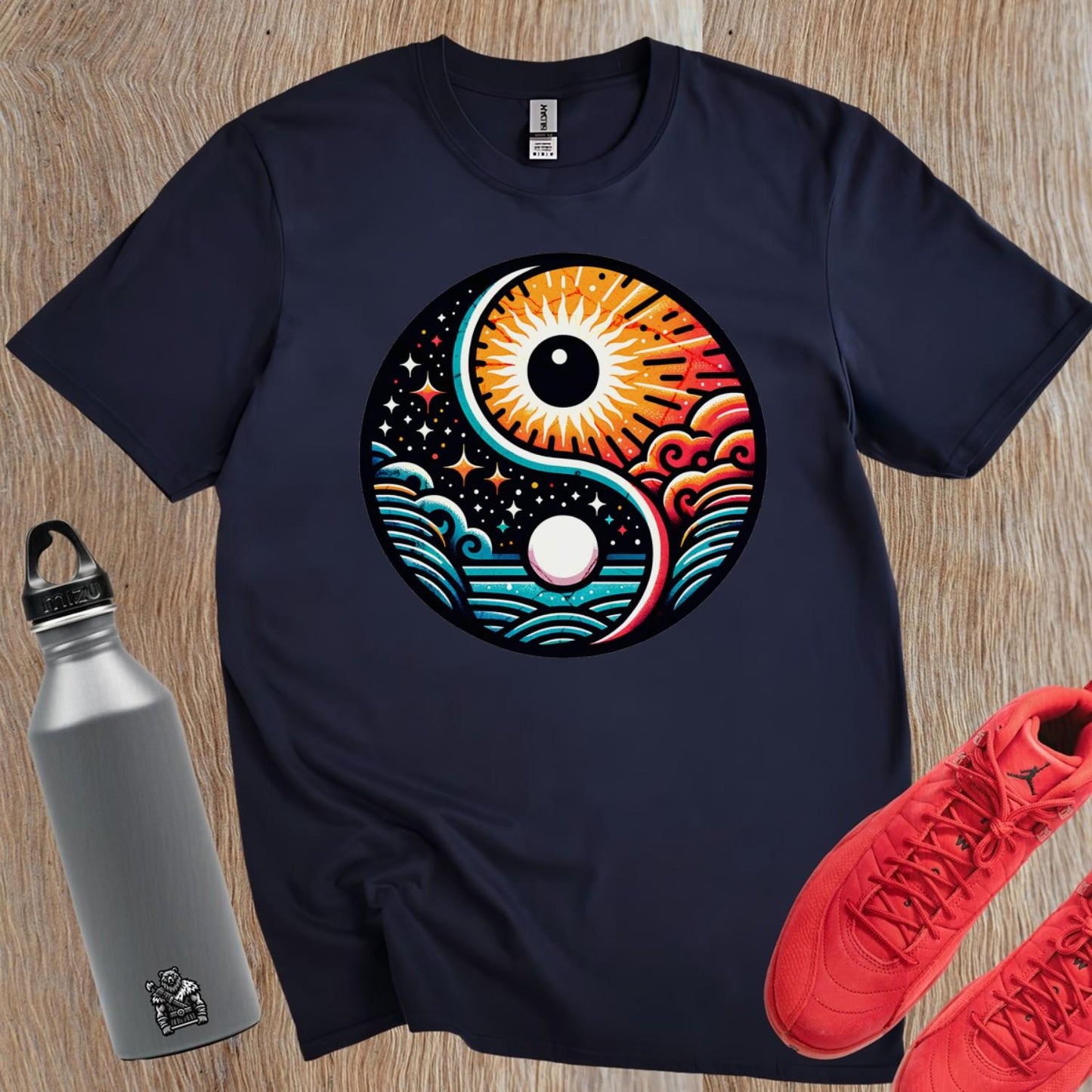 "Vibrant gym T-shirt featuring a bold yin-yang design with sun and moon elements, symbolizing harmony and strength for fitness enthusiasts."