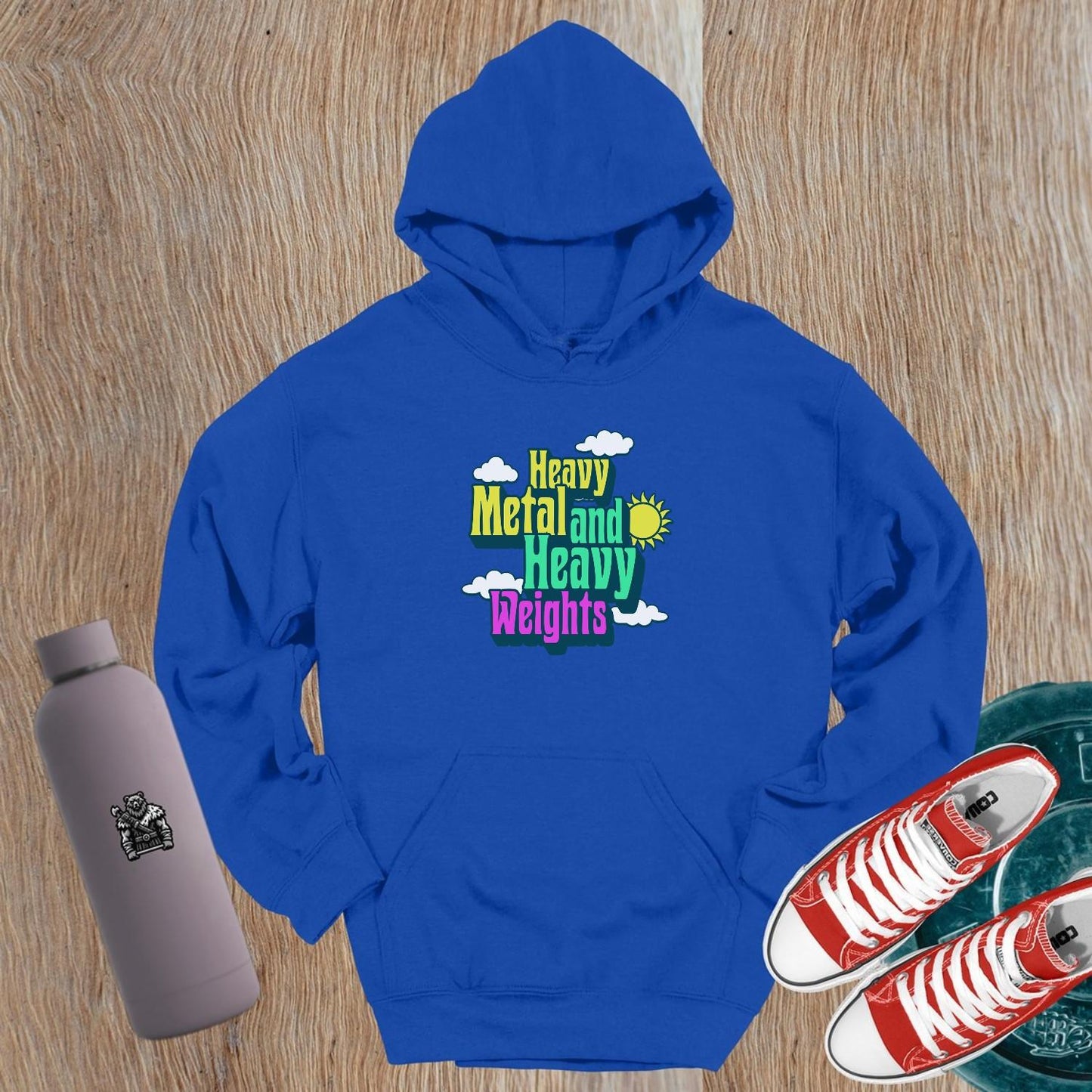 "Heavy Metal and Heavy Weights hoodie featuring vibrant graphics of weights and musical elements, perfect for fitness enthusiasts and gym lovers."