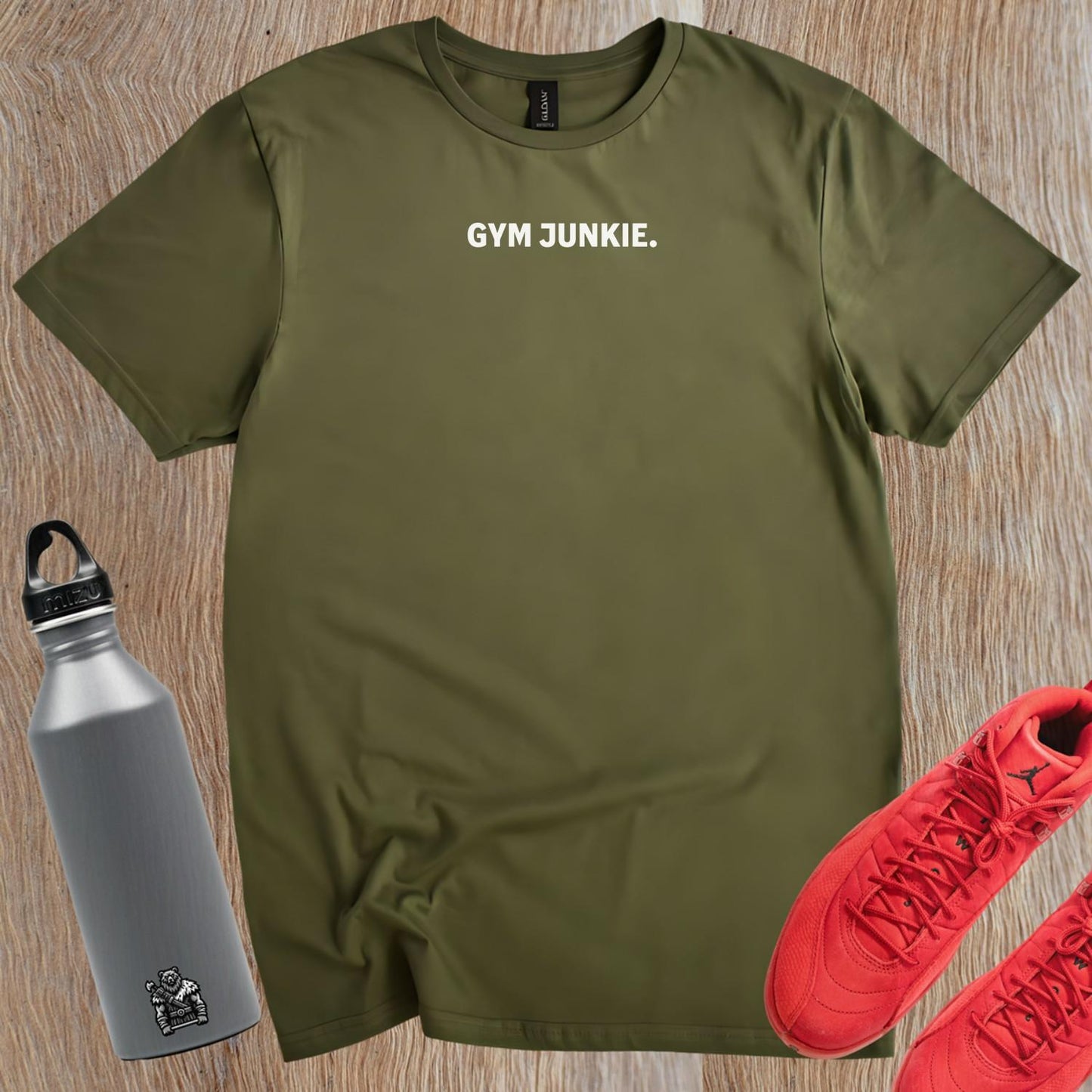 "Bold 'Gym Junkie' T-shirt featuring stylish typography, perfect for fitness enthusiasts. Ideal for workouts or casual outings."