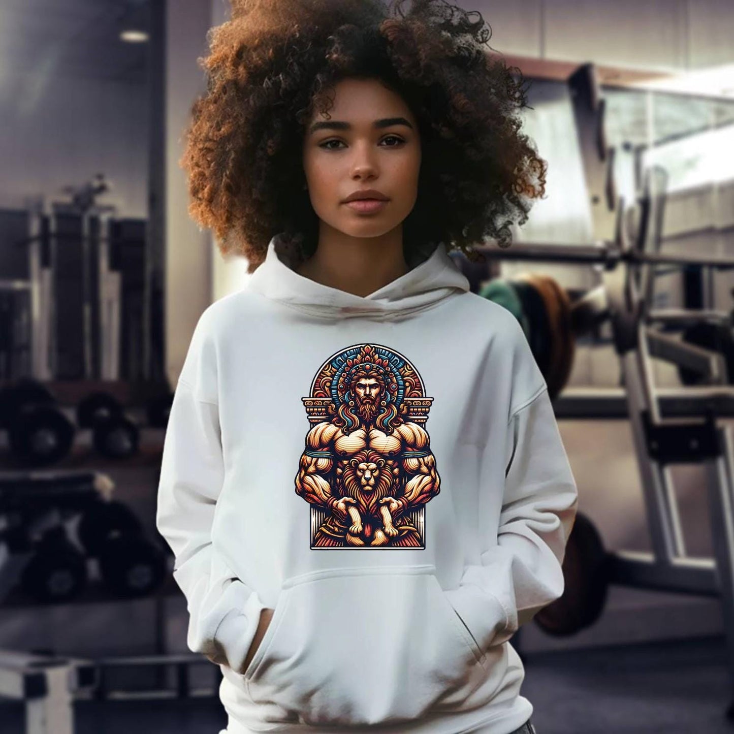 "Graphic gym hoodie featuring a muscular figure and fierce lion design, symbolizing strength, courage, and resilience for workout wear."