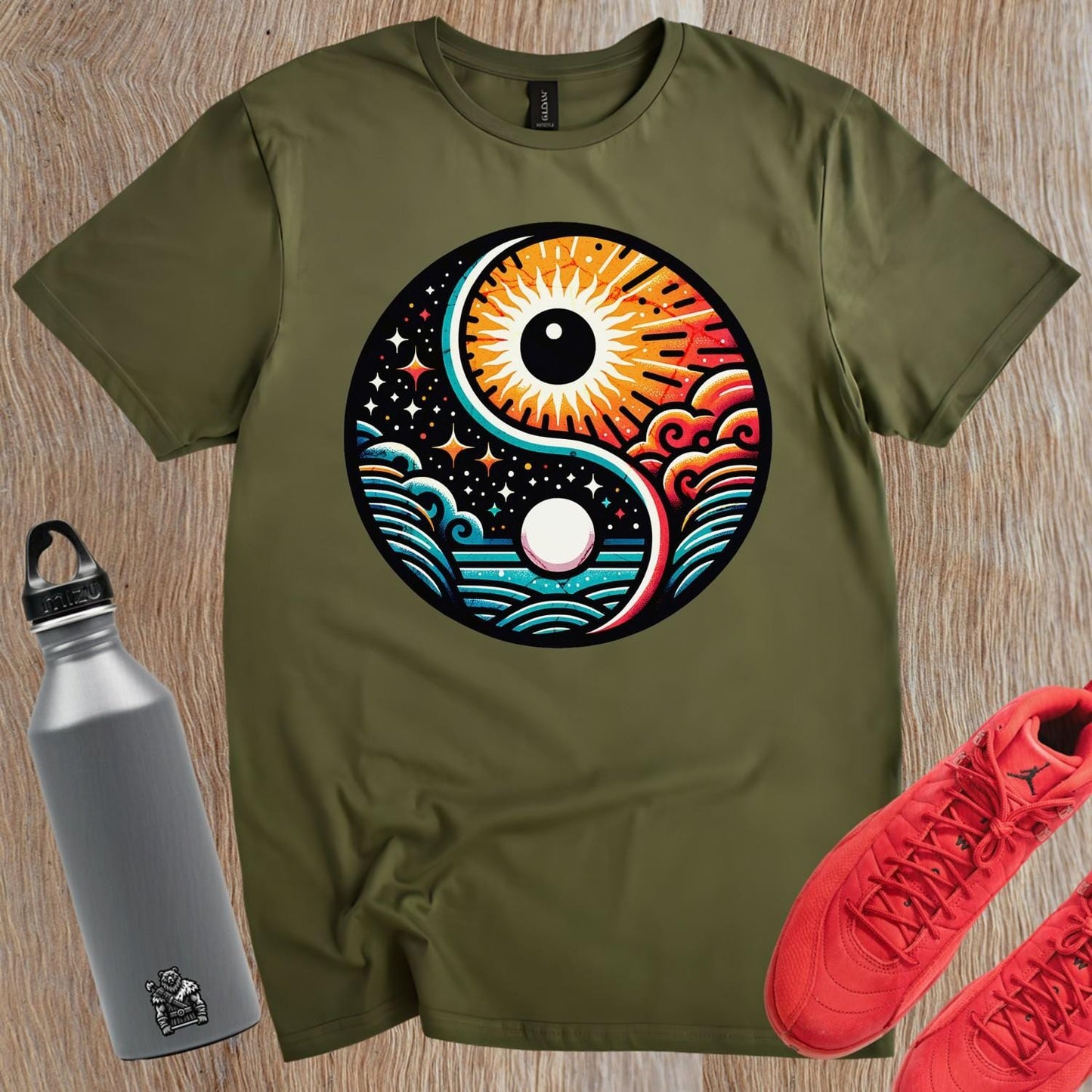"Vibrant gym T-shirt featuring a bold yin-yang design with sun and moon elements, symbolizing harmony and strength for fitness enthusiasts."