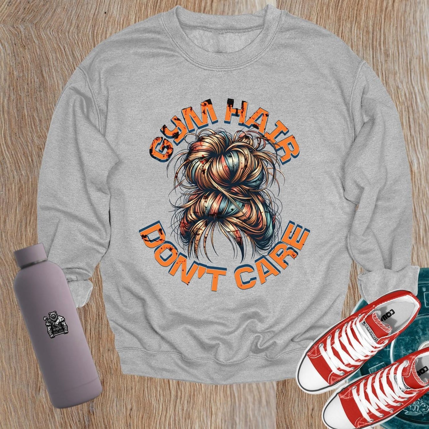 Alt text: "Bold 'Gym Hair Don't Care' sweatshirt design featuring a stylish crewneck, ideal for workouts or casual wear, celebrating gym culture."