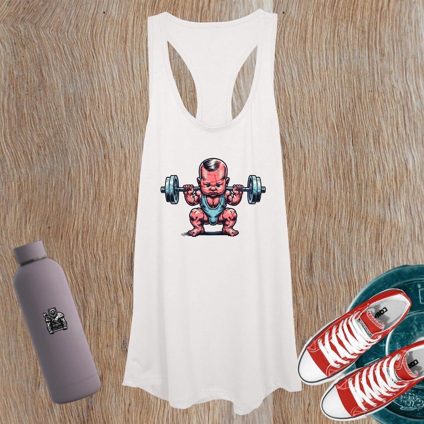 "Cheeky women's gym tank top featuring an adorable baby lifting weights, perfect for fitness motivation and stylish workouts."