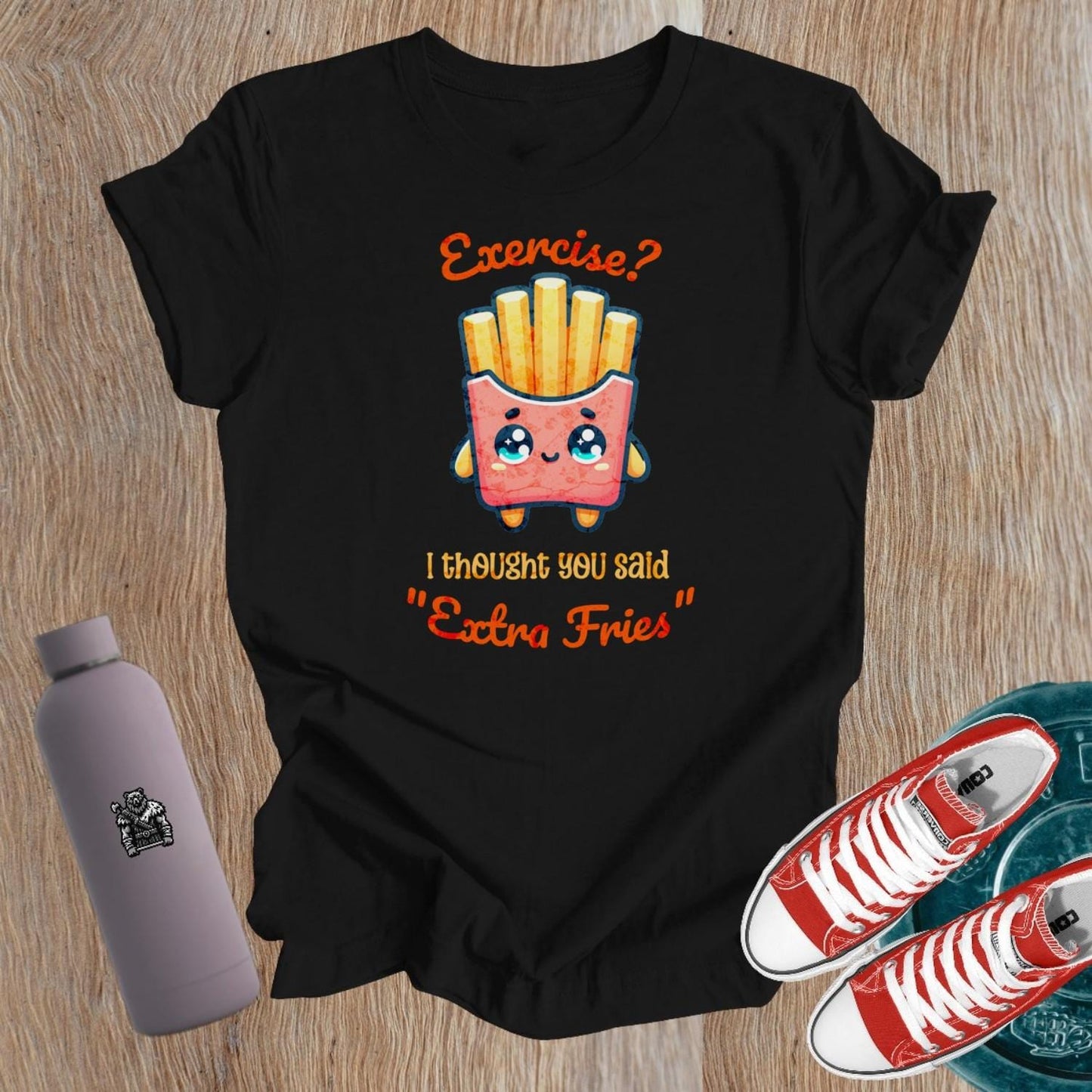 Cheeky "Extra Fries" T-shirt for women, blending fitness and humor. Perfect for confident gym-goers who embrace fun and balance!