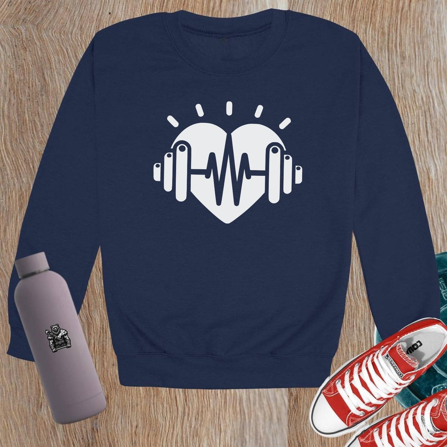 "Bold gym crewneck sweatshirt with empowering strength graphic, perfect for workouts or casual wear. Comfortable and stylish activewear."