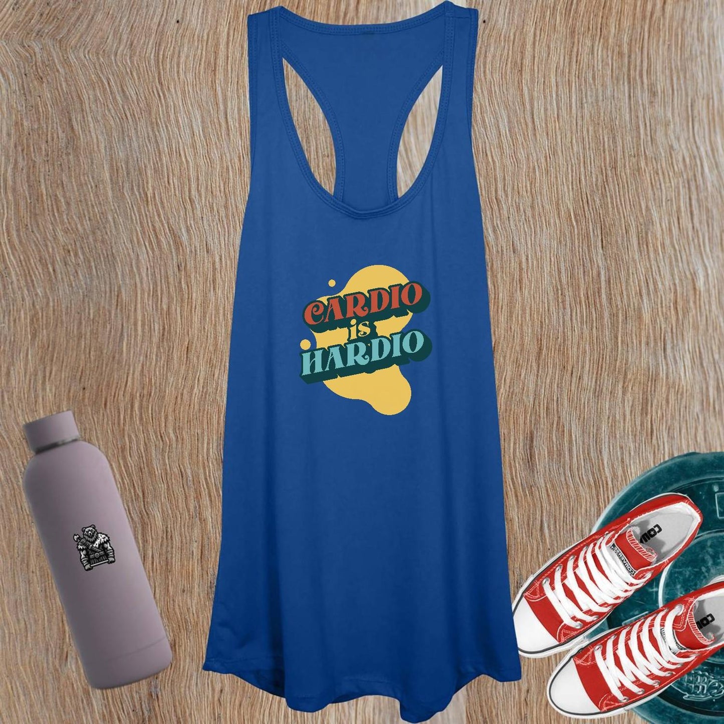 Alt text: "Women's tank top featuring a playful 'CARDIO is HARDIO' design, perfect for workouts and casual outings, showcasing a flattering fit."
