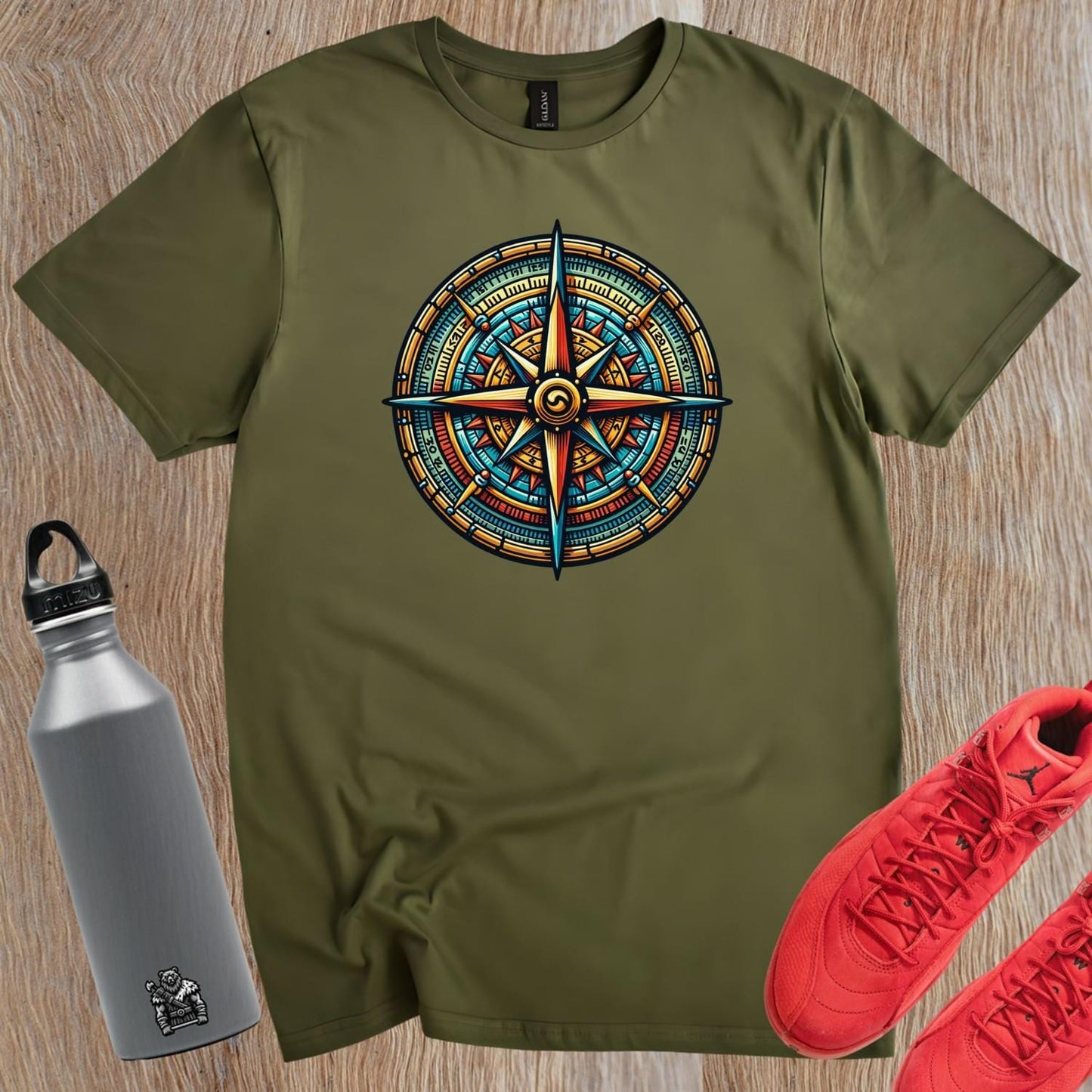 "Vibrant compass-themed gym T-shirt featuring motivational graphic, perfect for fitness enthusiasts seeking adventure and courage."