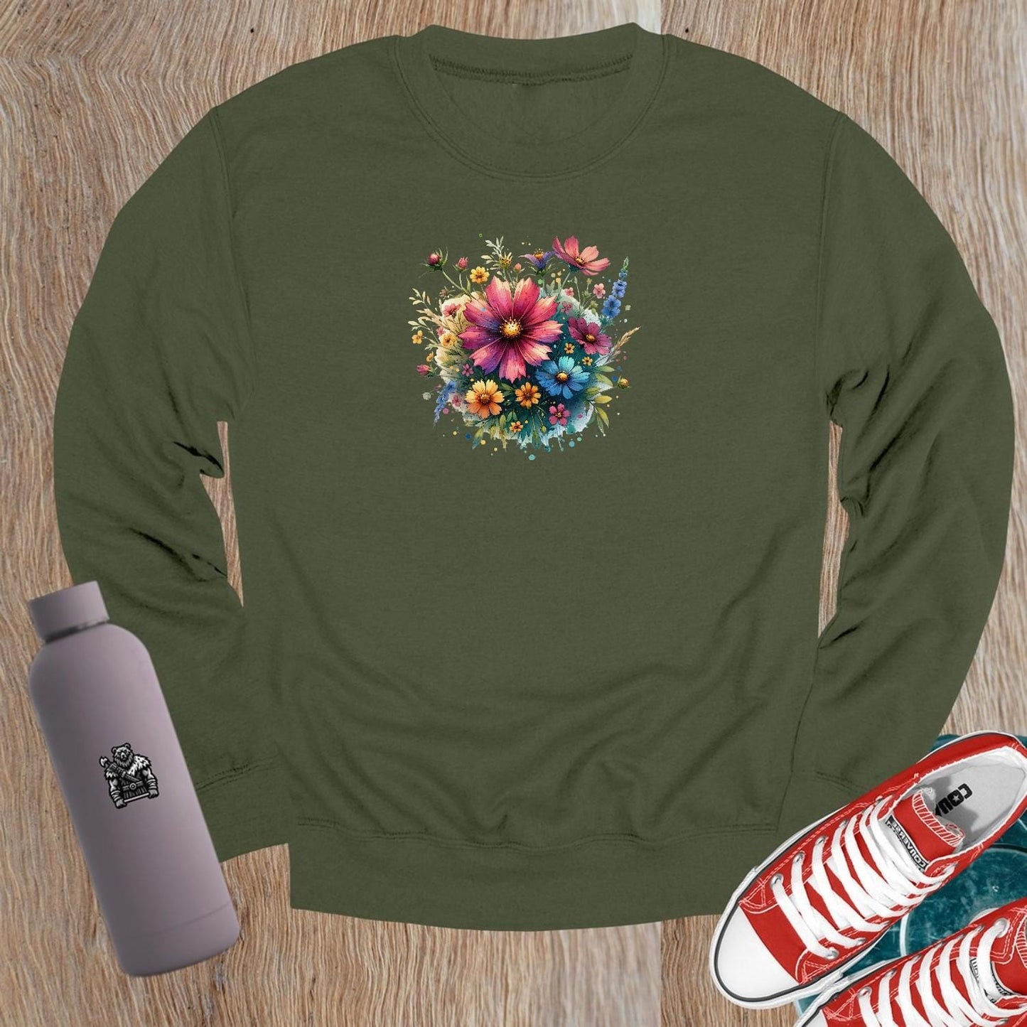 "Vibrant floral crewneck sweatshirt for gym and casual wear. Perfect blend of comfort and style for workouts, leggings, and shorts."