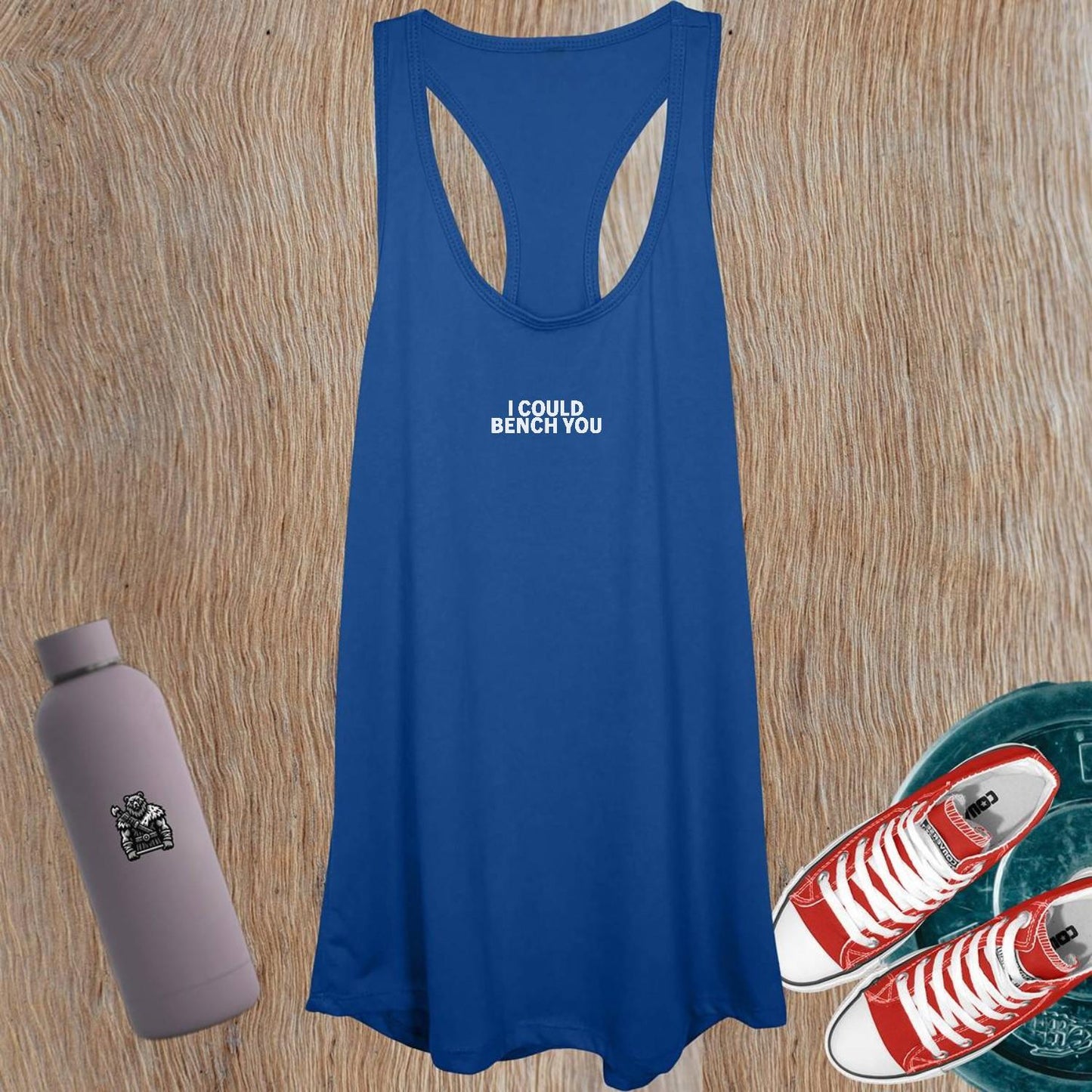 Alt text: "Bold Women's Tank Top in vibrant color featuring empowering phrase 'I Could Bench You' represents fierce gym style and confidence."
