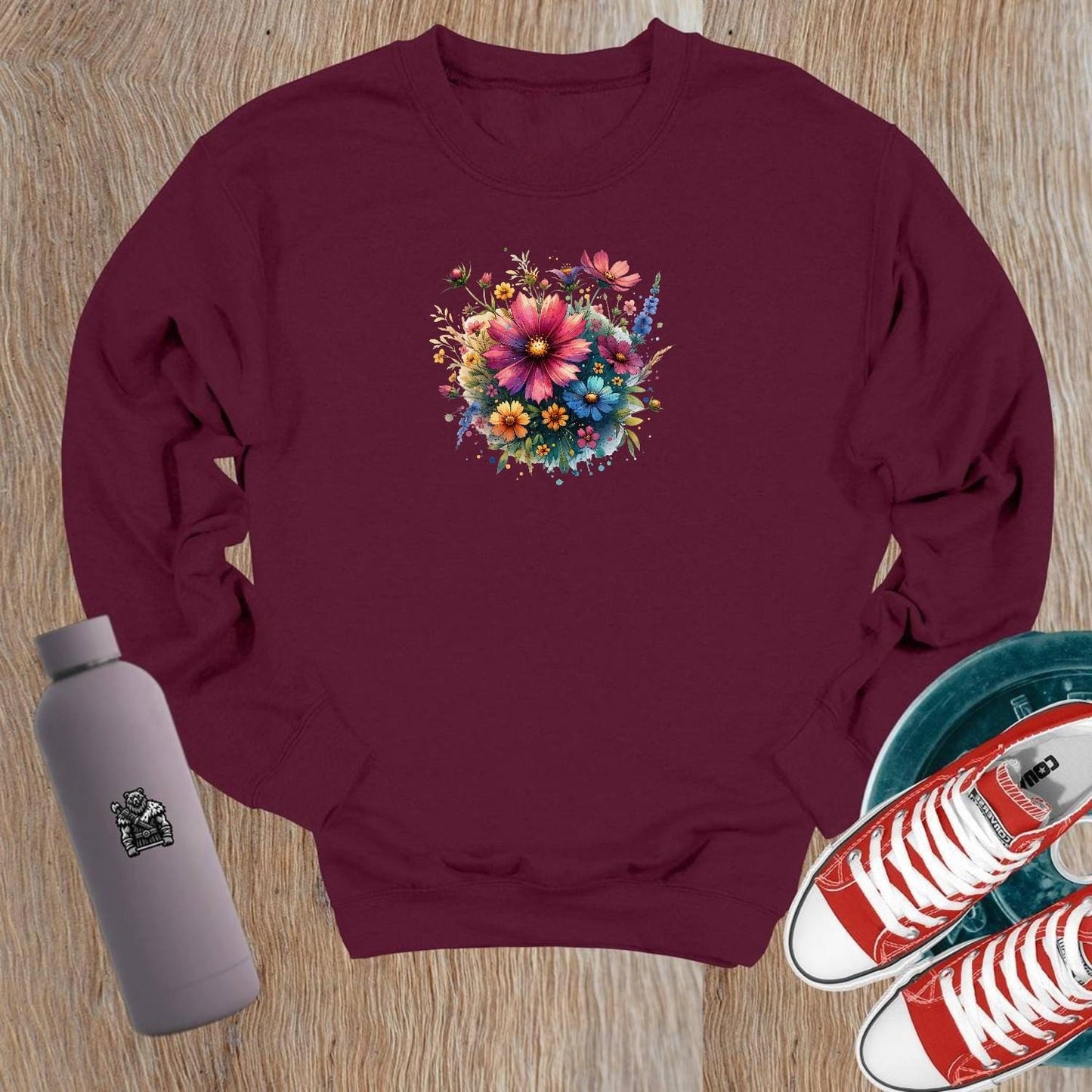 "Vibrant floral crewneck sweatshirt for gym and casual wear. Perfect blend of comfort and style for workouts, leggings, and shorts."