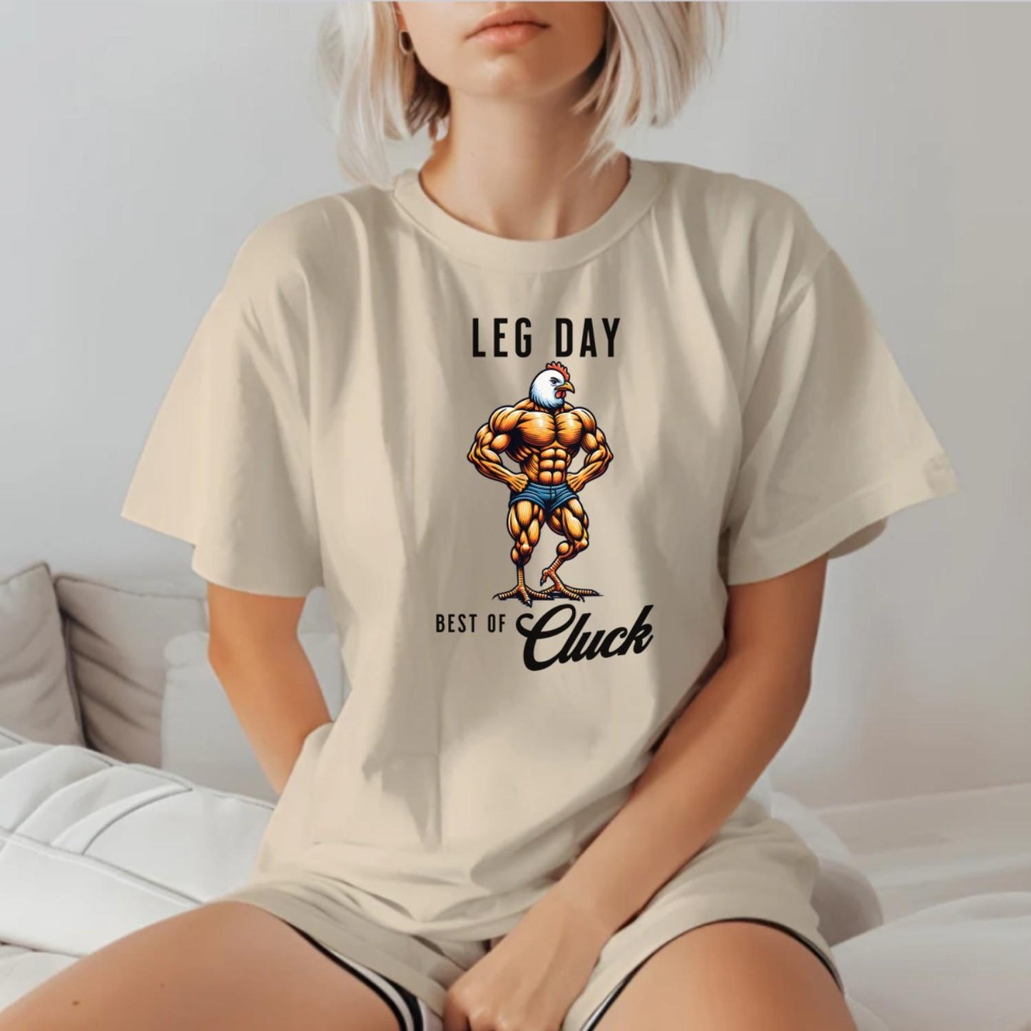 "Bold gym T-shirt featuring a unique muscular chicken design, perfect for fitness enthusiasts. Ideal for workouts, weightlifting, and cardio."
