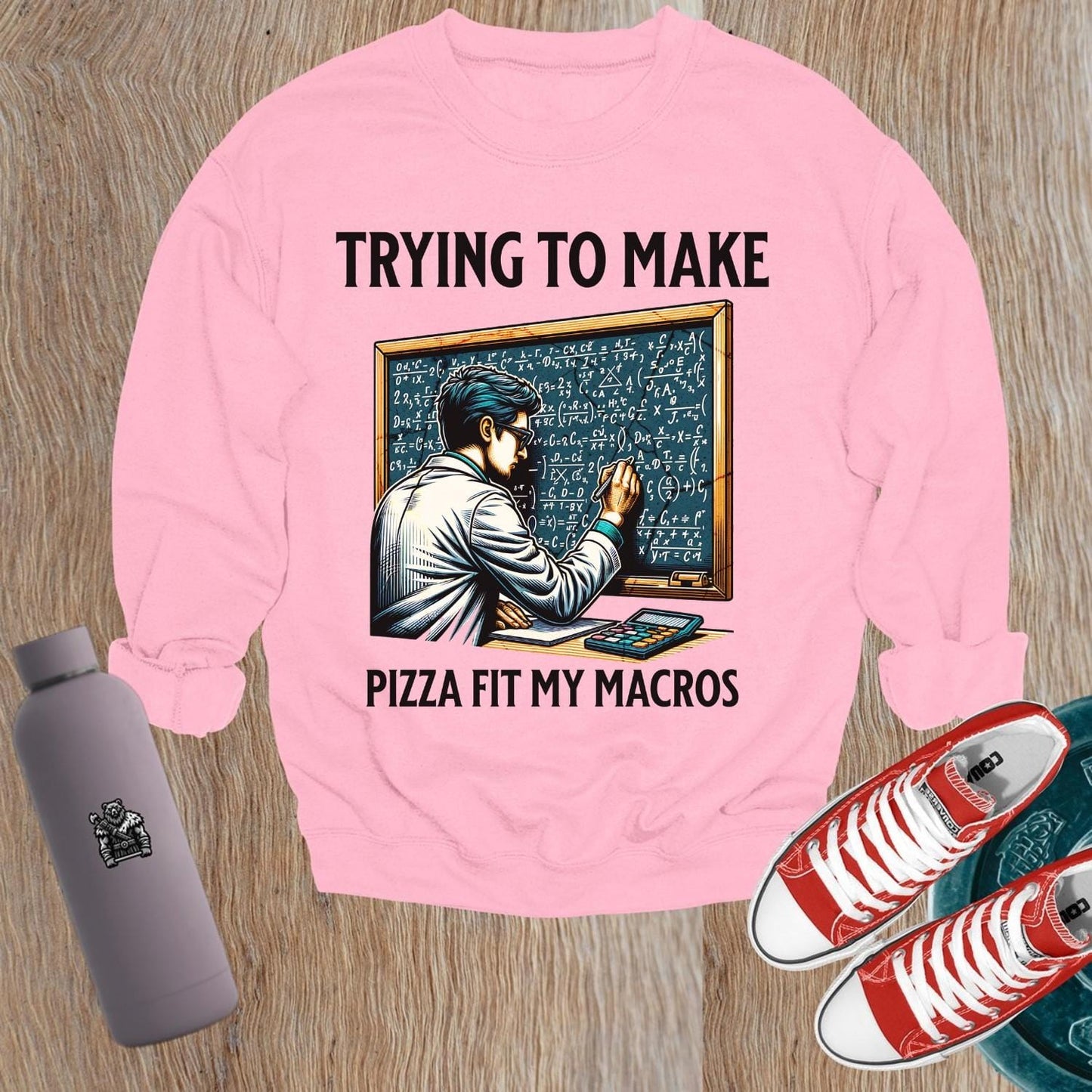 Alt text: "Witty 'Trying to Make Pizza Fit My Macros' sweatshirt design, featuring fitness-themed graphics. Perfect for gym enthusiasts."