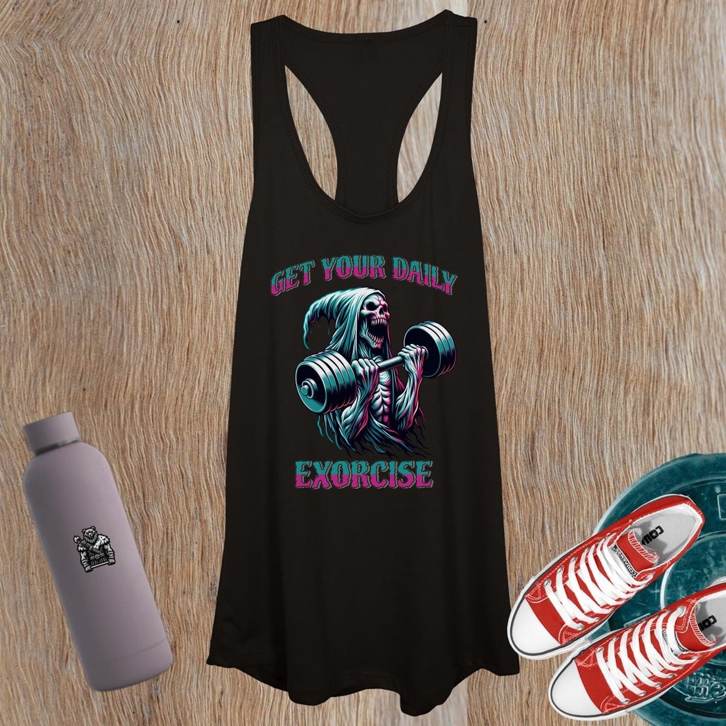 "Women's tank top featuring a bold graphic of a skeletal figure lifting weights, symbolizing strength and motivation for workouts."