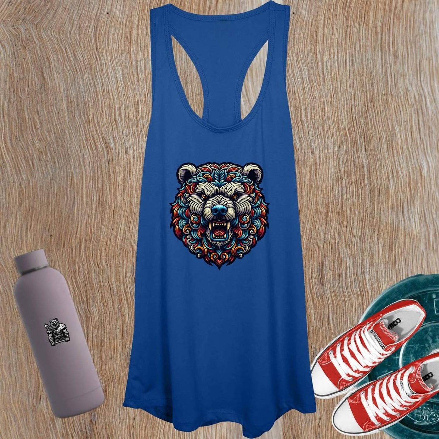 "Fierce women's tank top featuring a powerful bear graphic, perfect for workouts and casual outings. Showcases strength and confidence."