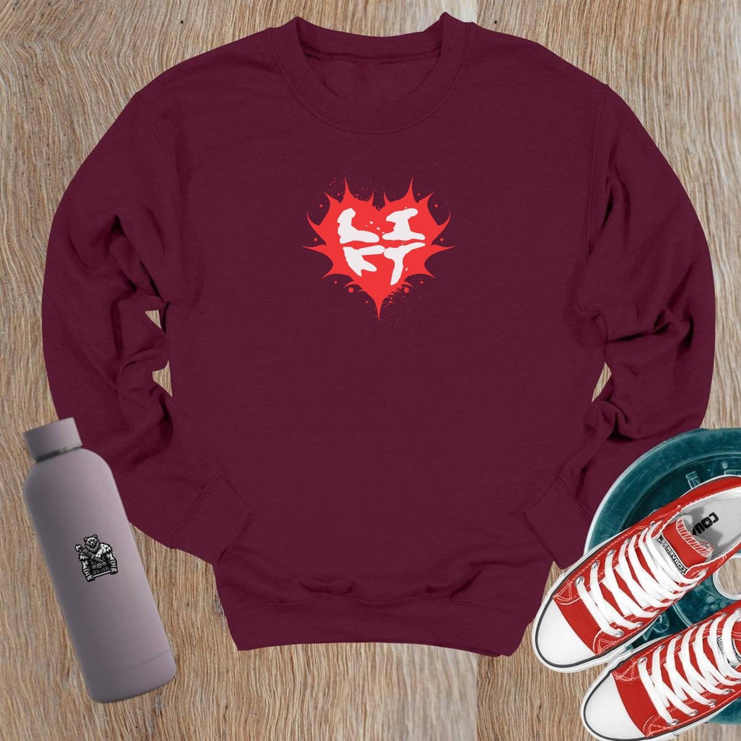 "Stylish crewneck sweatshirt with a vibrant heart design, ideal for fitness enthusiasts. Perfect for workouts and casual wear."