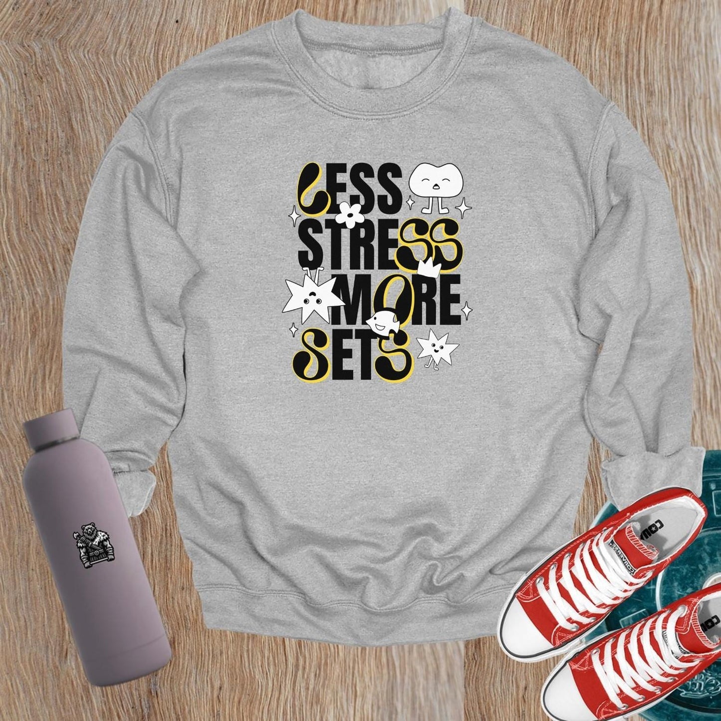 "Vibrant gym sweatshirt with unique designs, ideal for workouts or lounging, paired with leggings for a confident, stylish look."