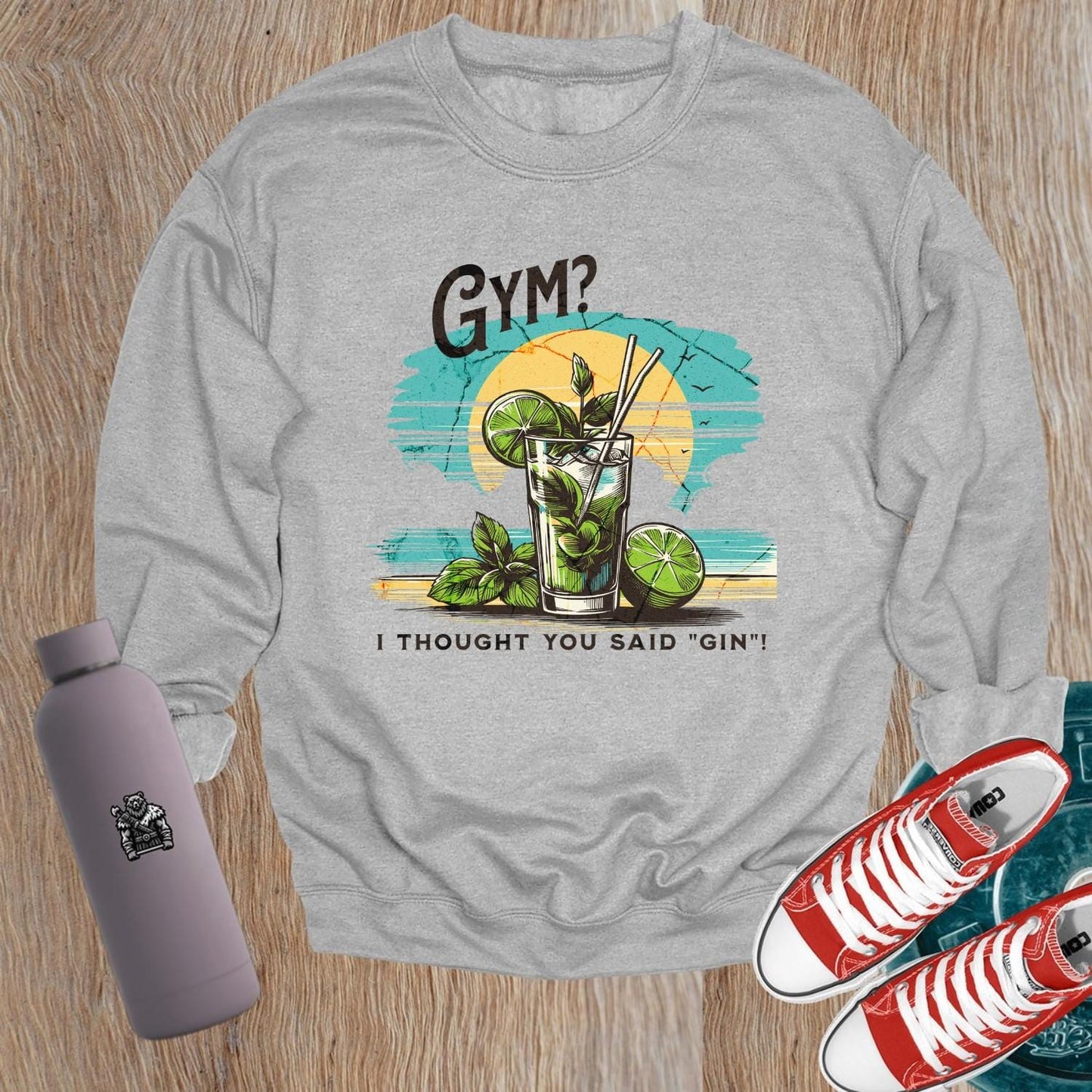 Alt text: "Lighthearted gym sweatshirt reads 'Gym? I Thought You Said Gin!' with a fun cocktail graphic, perfect for fitness enthusiasts."