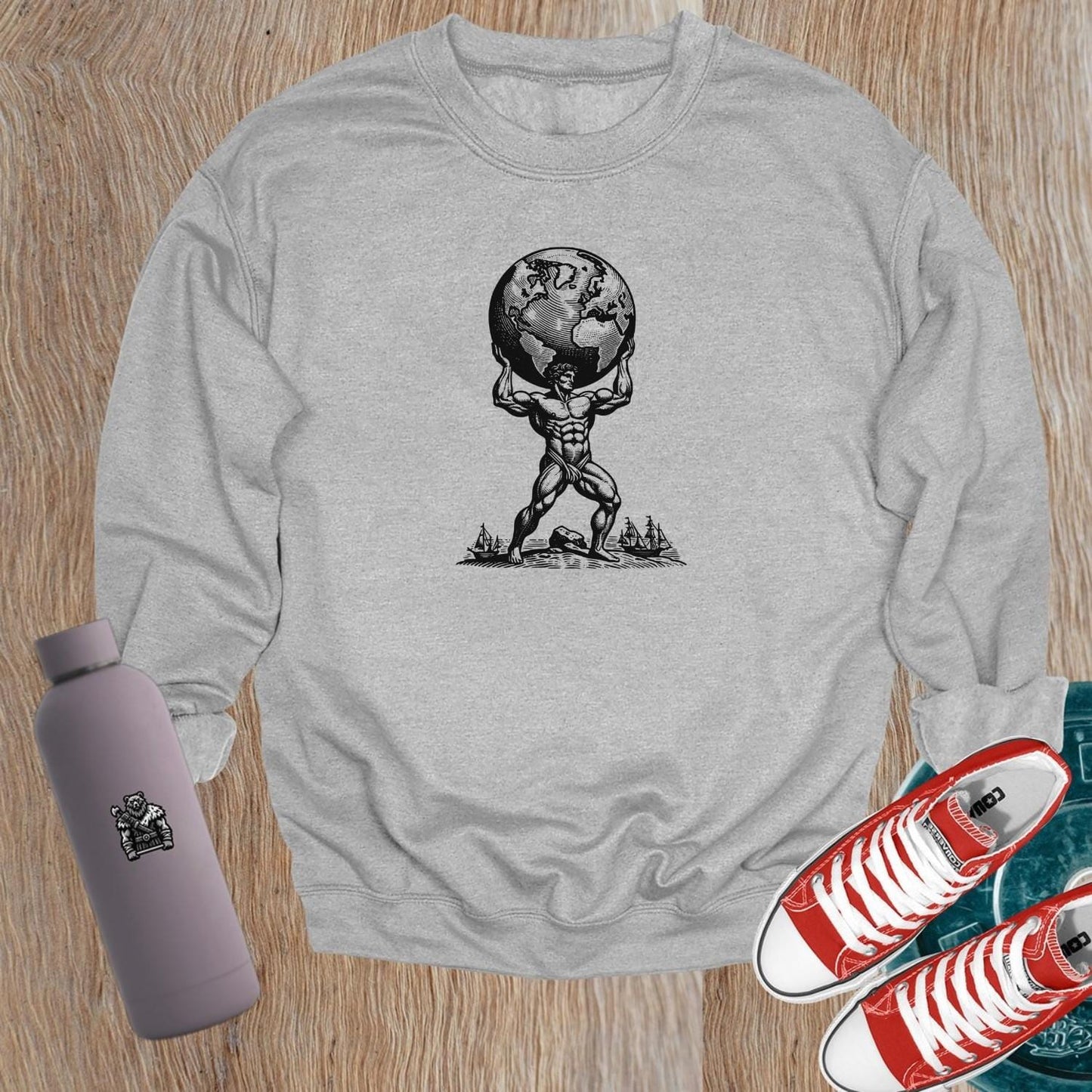 "Men's gym sweatshirt featuring an inspiring strength graphic, designed for comfort and style during workouts or casual wear."