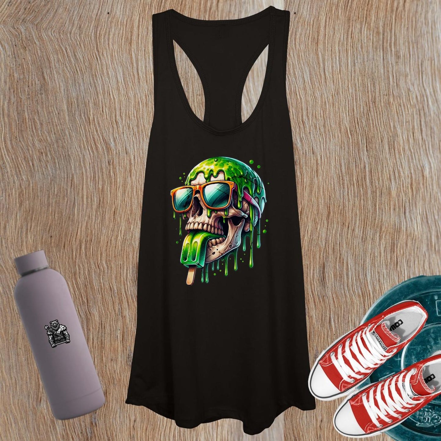 "Women's tank top featuring bold skull graphic, perfect for fearless fitness enthusiasts. Ideal for gym workouts and unique style."