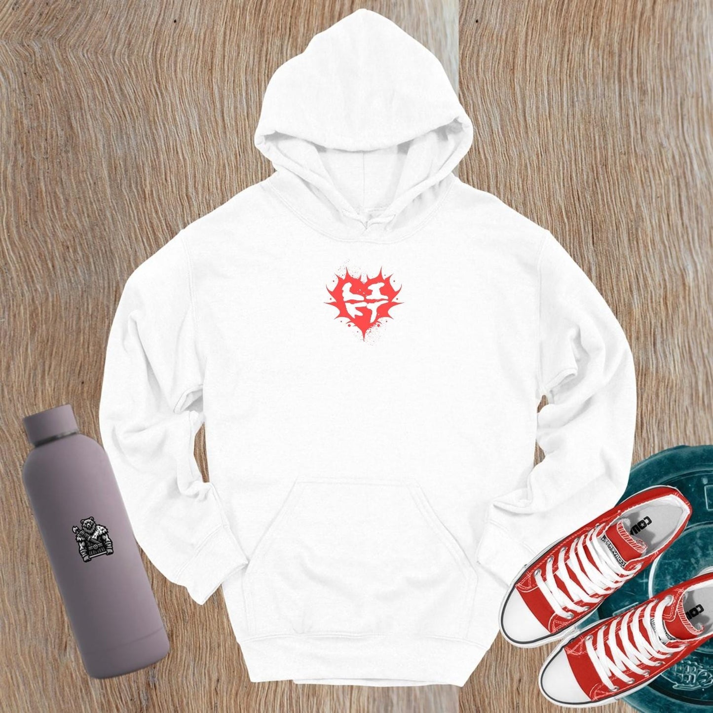 "Bold gym hoodie featuring a vibrant heart graphic and motivational design, perfect for fitness enthusiasts. Relaxed fit for comfort."