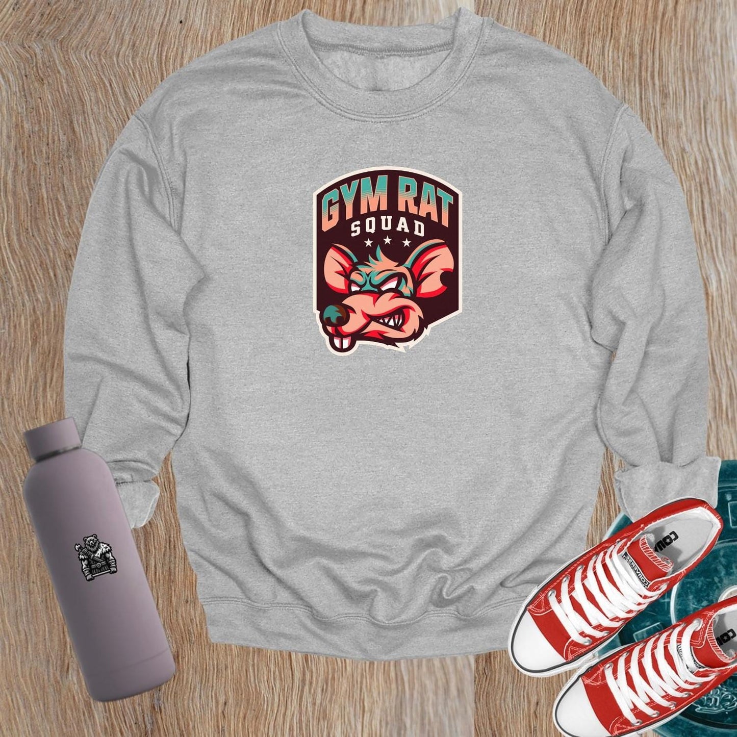 "Vibrant Gym Rat Squad sweatshirt, showcasing a motivational design for fitness lovers. Perfect for workouts or casual wear, embodying dedication."