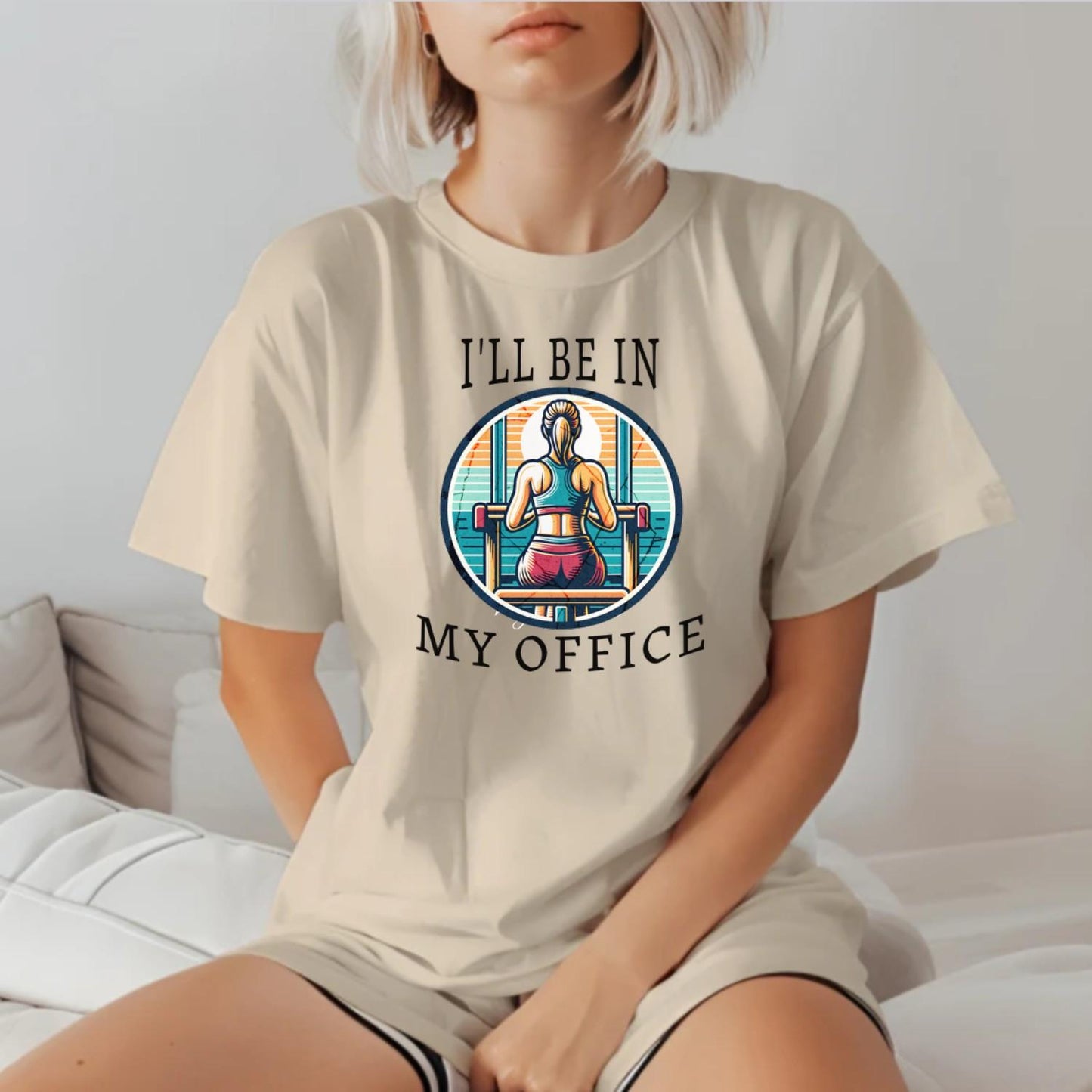 Alt text: "Stylish 'I'll Be in My Office' gym T-shirt featuring a motivational graphic, perfect for workouts and casual outings, embodies fitness passion."