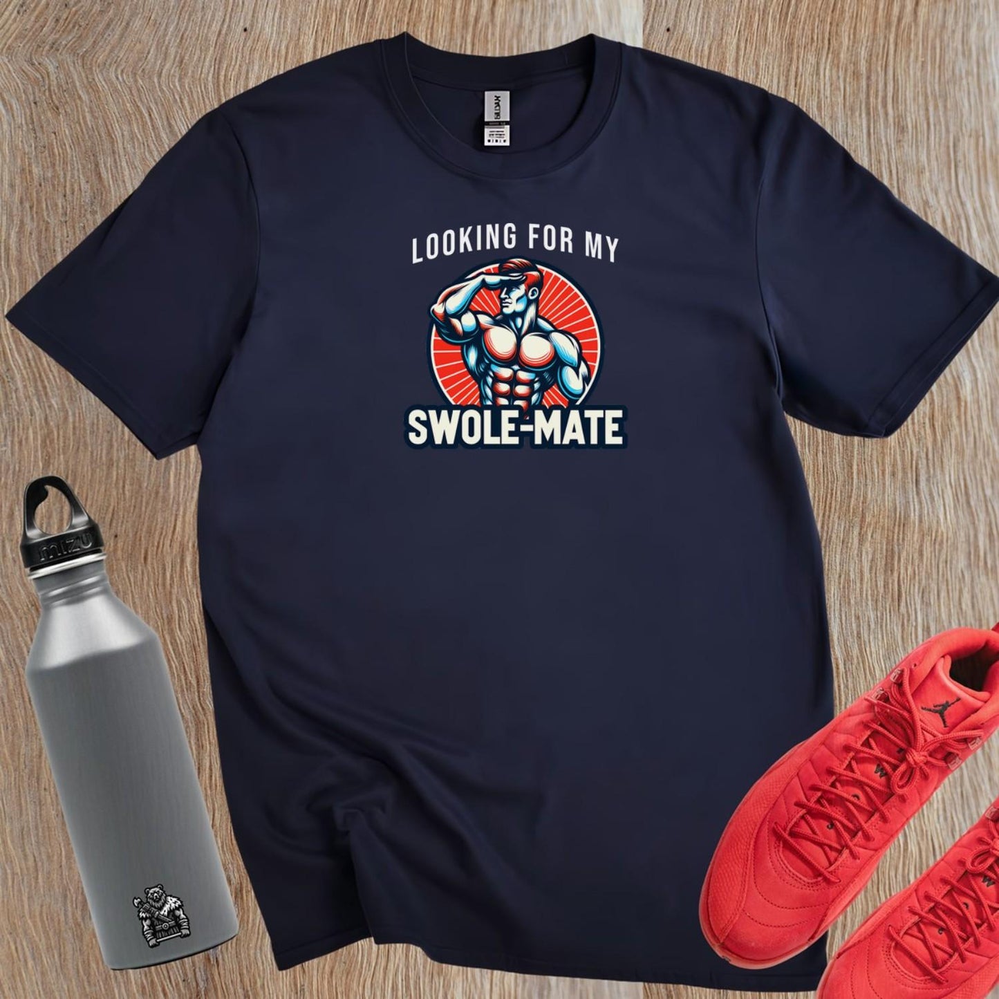 Alt text: "Swole-Mate T-shirt design featuring bold lettering and a fit silhouette, perfect for gym workouts and casual outings. Show your dedication to fitness and join the community of fitness enthusiasts."