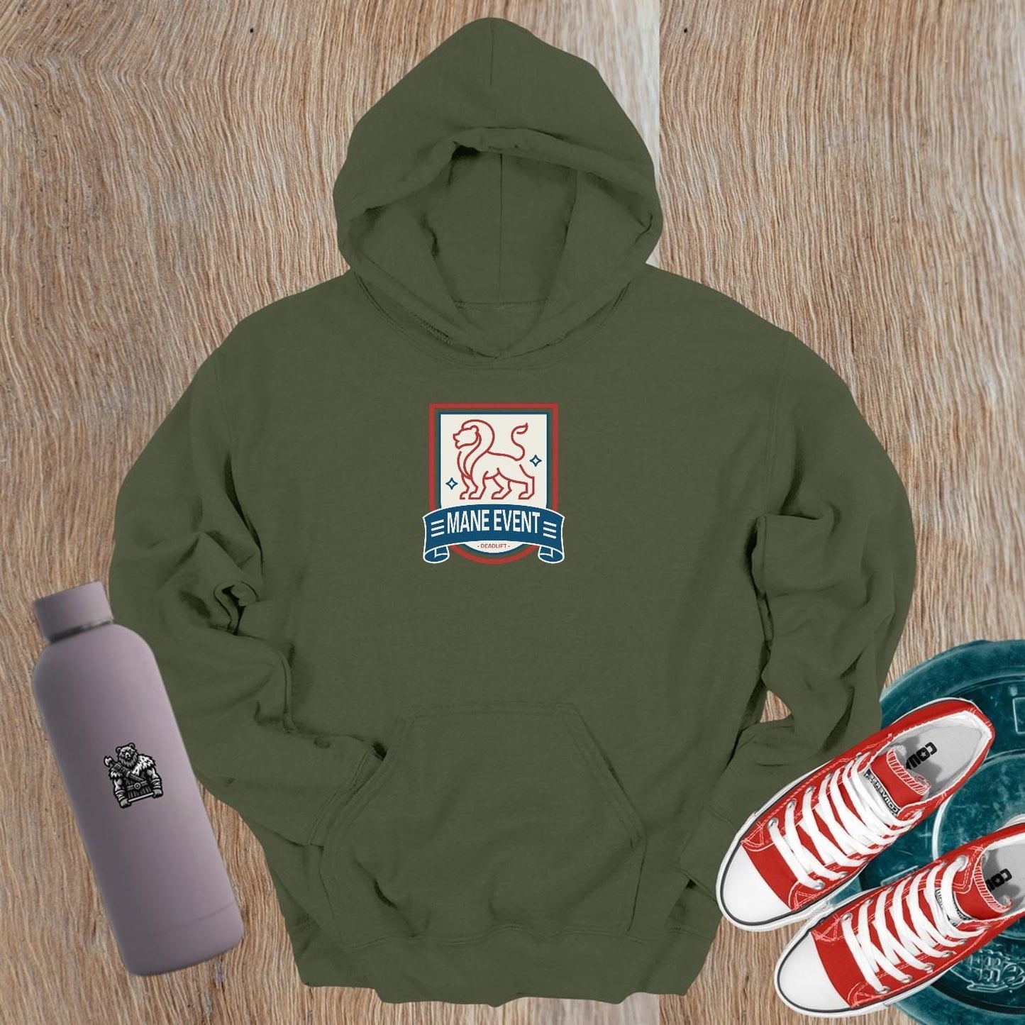 "Bold lion emblem hoodie for gym wear, ideal for lifters. Stylish design complements workouts, warm-ups, and post-gym relaxation."