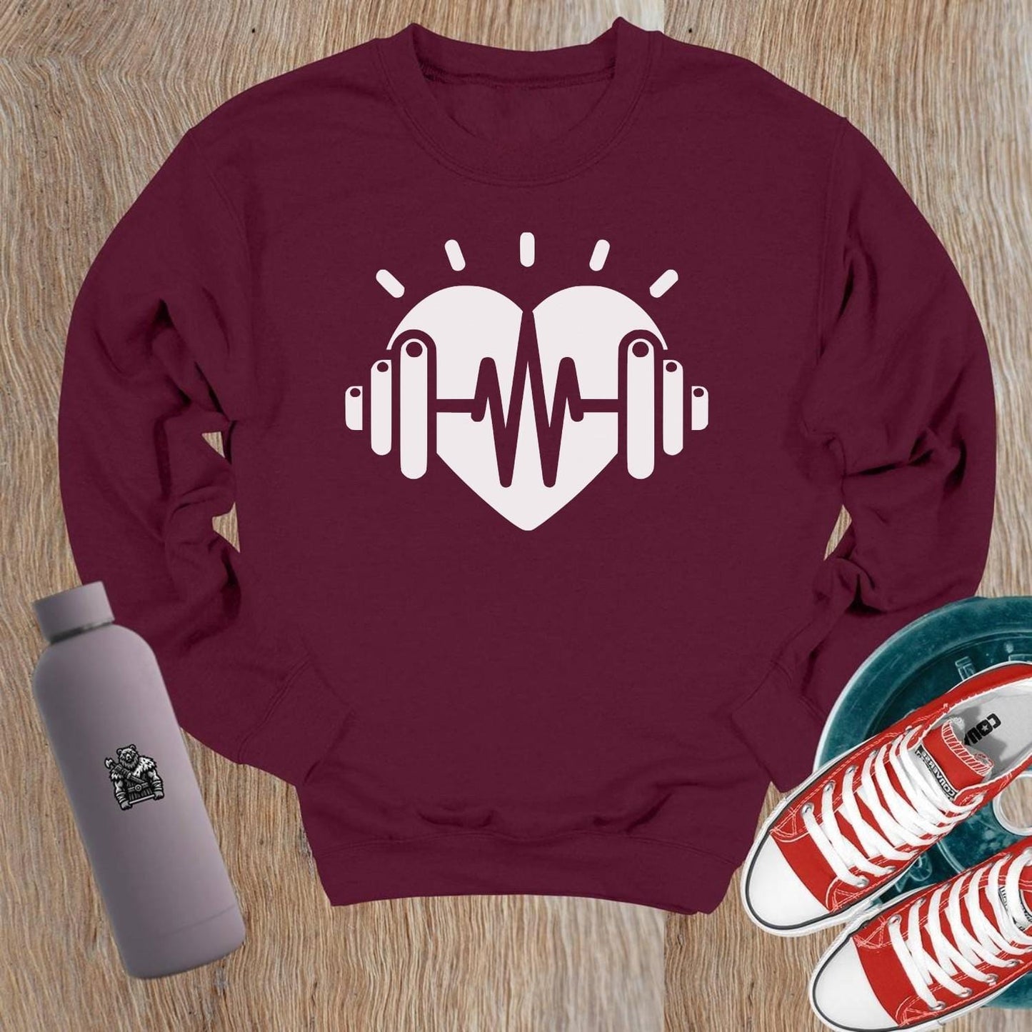 "Bold gym crewneck sweatshirt with empowering strength graphic, perfect for workouts or casual wear. Comfortable and stylish activewear."