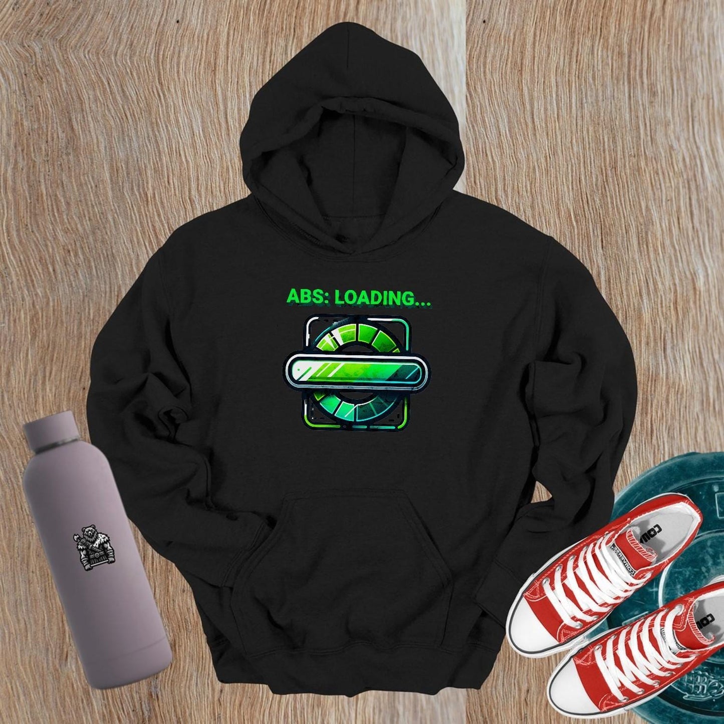 Alt text: "Vibrant gym hoodie featuring 'ABS: LOADING...' graphic, perfect for fitness enthusiasts. Ideal for workouts and casual wear."