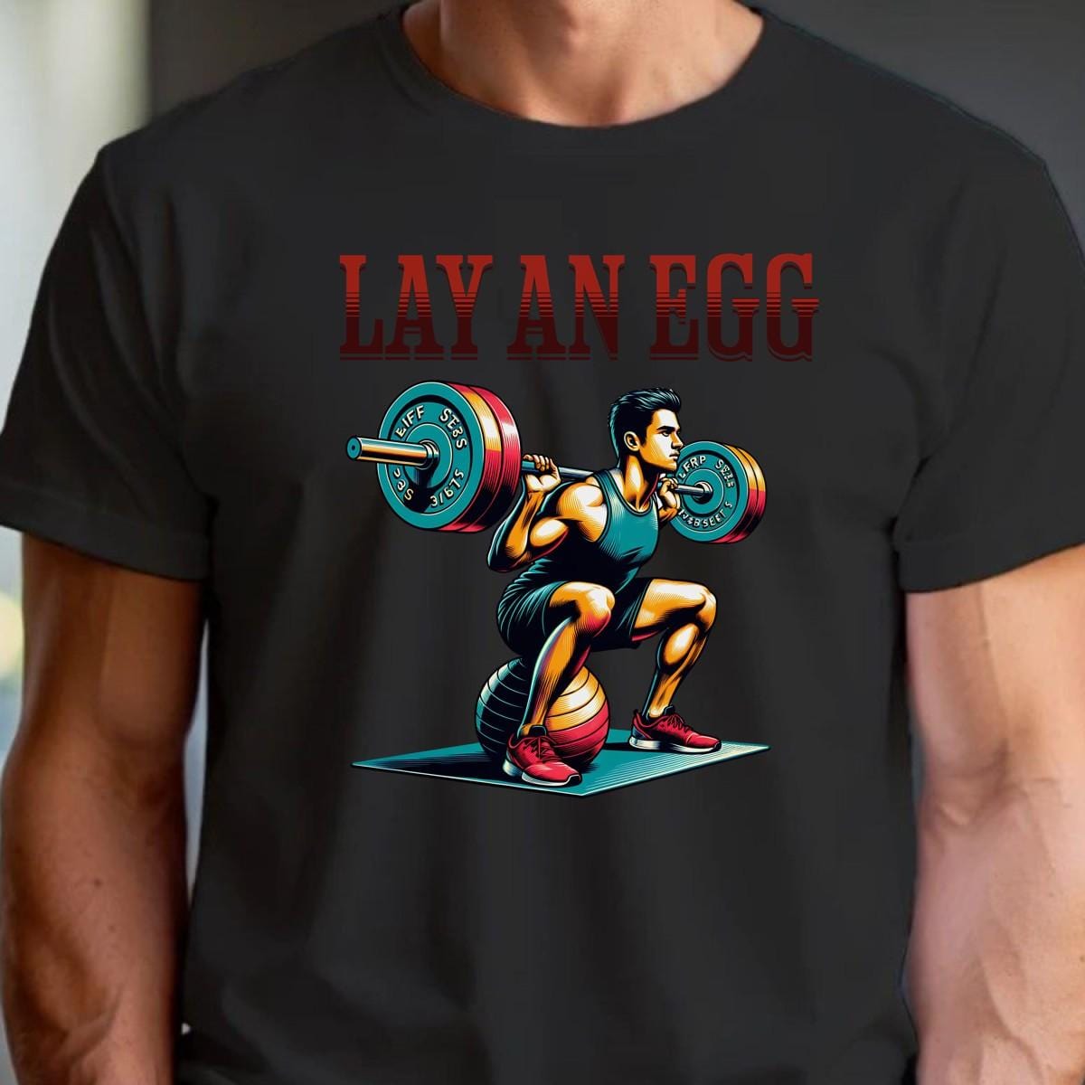 "Graphic gym T-shirt featuring 'Lay An Egg' design, showcasing humor in fitness. Ideal for workouts, casual outings, and style."