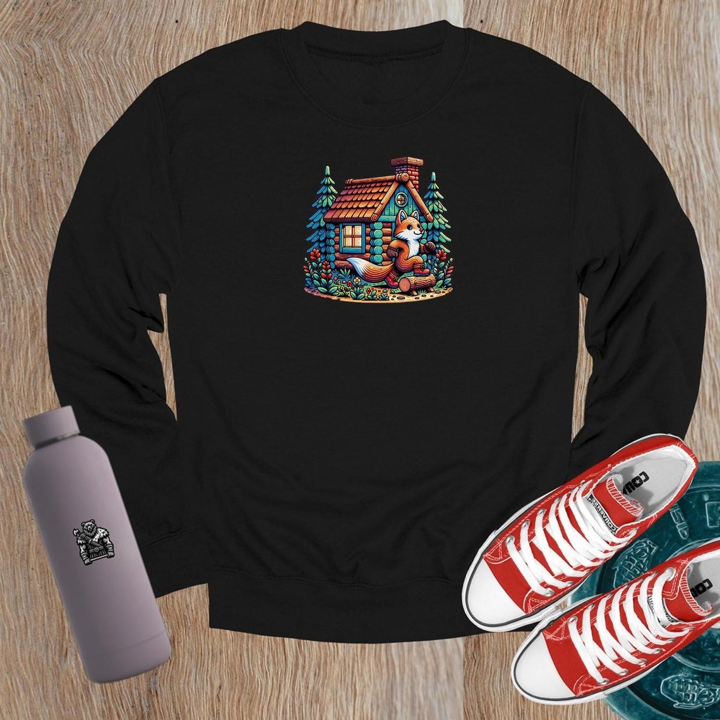 "Cozy crewneck sweatshirt featuring a playful fox beside a charming log cabin, perfect for gym workouts or casual lounging."