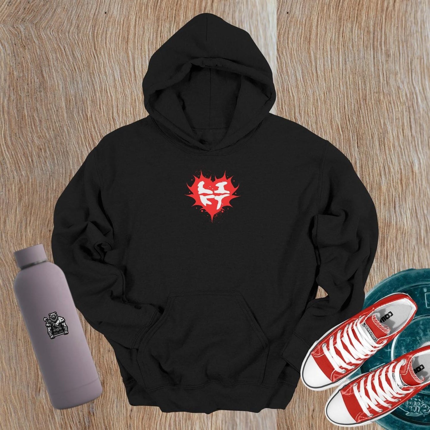 "Stylish gym hoodie featuring a vibrant heart logo, perfect for fitness enthusiasts. Ideal for workouts or casual wear."